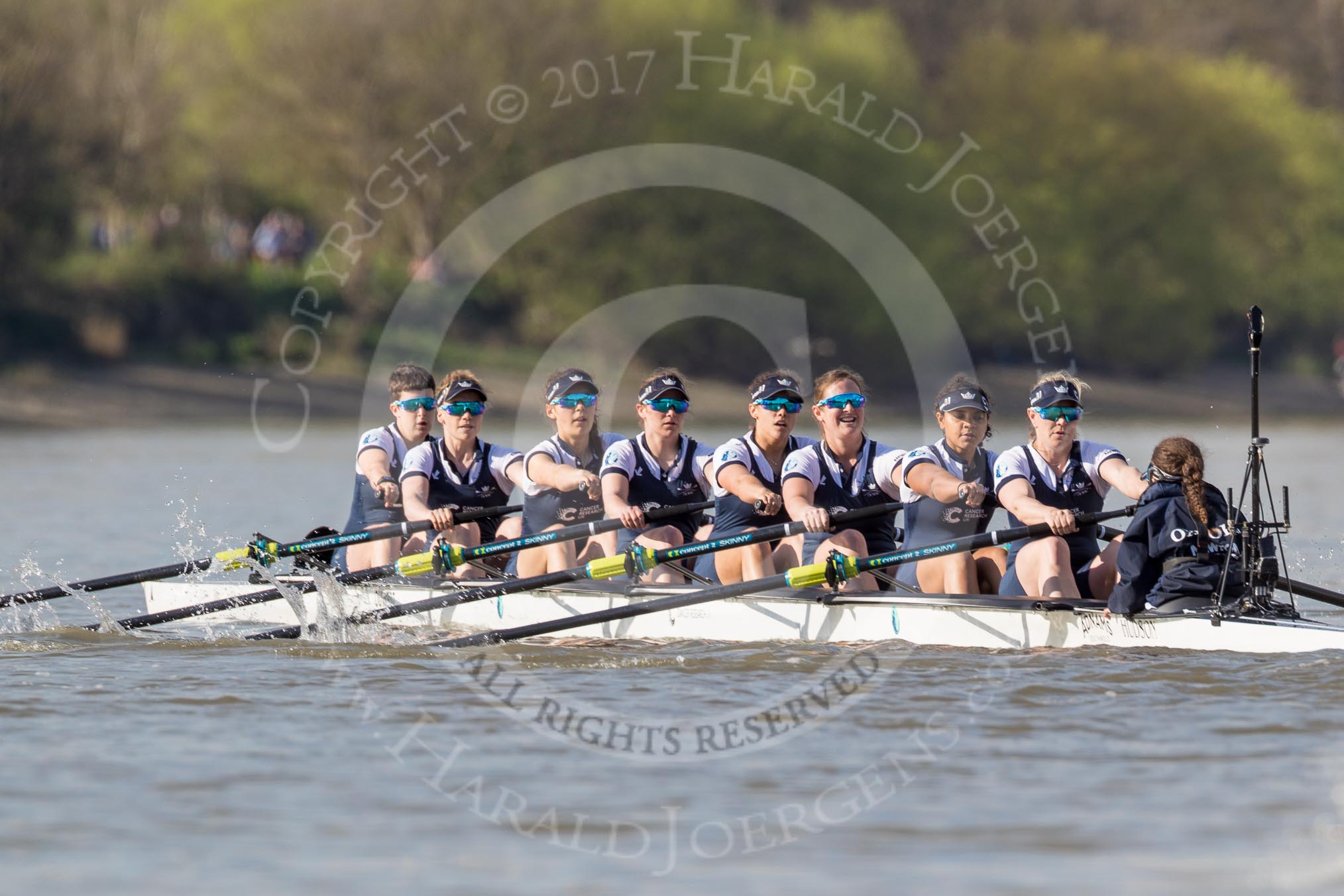 The Boat Race season 2017 -  The Cancer Research Women's Boat Race: OUWBC working hard to catch up with Cambridge, here bow Alice Roberts, 2 Flo Pickles, 3 Rebecca Te Water Naudé, 4 Rebecca Esselstein, 5 Chloe Laverack, 6 Harriet Austin, 7 Jenna Hebert, stroke Emily Cameron, cox Eleanor Shearer.
River Thames between Putney Bridge and Mortlake,
London SW15,

United Kingdom,
on 02 April 2017 at 16:37, image #138