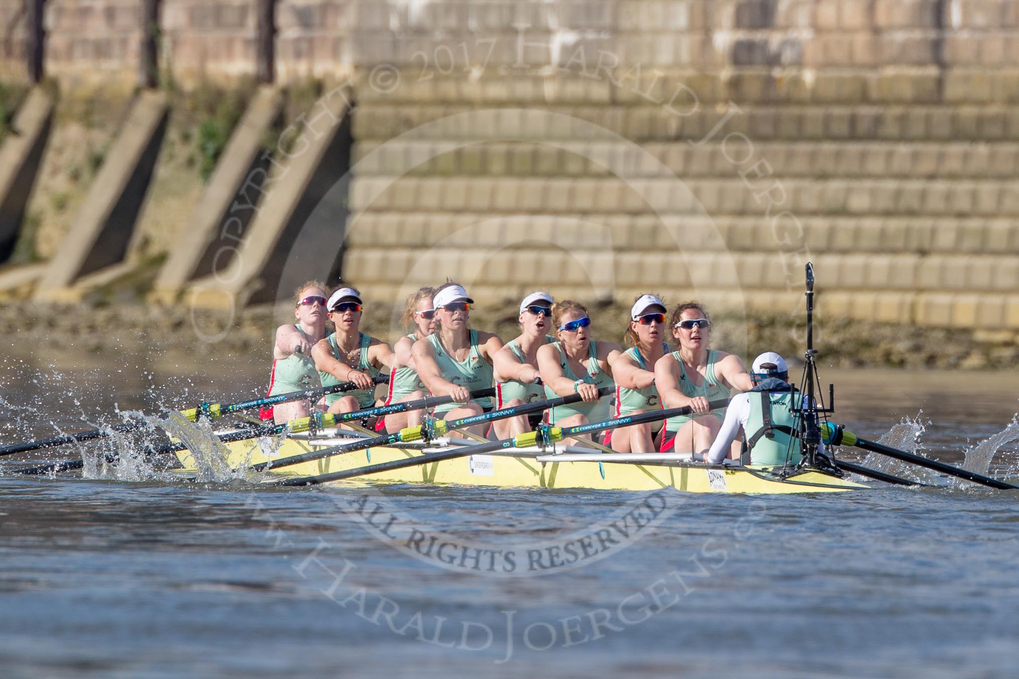 Photo 1704021641161X29530HaraldJoergens The Boat Race season 2017 - The Cancer Research Women's Boat Race: Cambridge is keeping their comfortable lead at Fulham Reach - bow Ashton Brown, 2 Imogen Grant, 3 Claire Lambe, 4 Anna Dawson, 5 Holly Hill, 6 Alice White, 7 Myriam Goudet, stroke Melissa Wilson, cox Matthew Holland.
River Thames between Putney Bridge and Mortlake,
London SW15,
United Kingdom,
on 02 April 2017 at 16:41, image #151