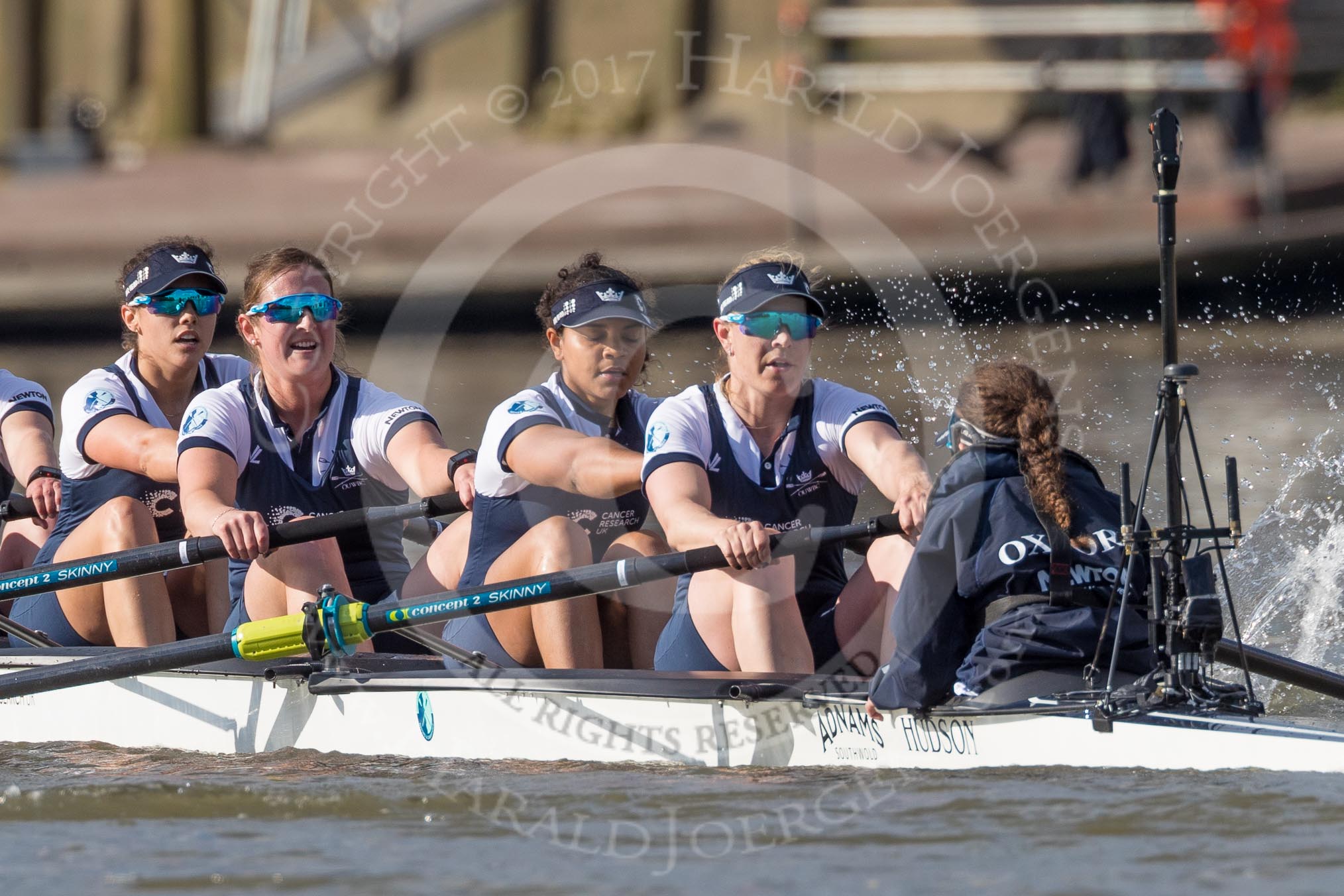 Photo 1704021642201X29576HaraldJoergens The Boat Race season 2017 - The Cancer Research Women's Boat Race: Closu-up of OUWBC on the approach to Hammersmith Bridge, here 5 Chloe Laverack, 6 Harriet Austin, 7 Jenna Hebert, stroke Emily Cameron, cox Eleanor Shearer.
River Thames between Putney Bridge and Mortlake,
London SW15,
United Kingdom,
on 02 April 2017 at 16:42, image #159