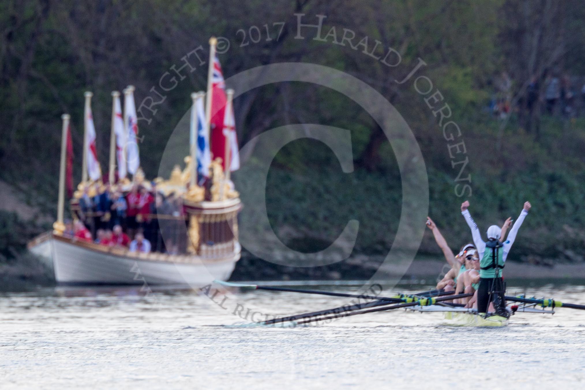 Photo 1704021654131X29957HaraldJoergens The Boat Race season 2017 - The Cancer Research Women's Boat Race: Cambridge has won the Women's Boat Race, with jubilant cox Matthew Holland. On the left the Royal Barge Gloriana.
River Thames between Putney Bridge and Mortlake,
London SW15,
United Kingdom,
on 02 April 2017 at 16:54, image #181