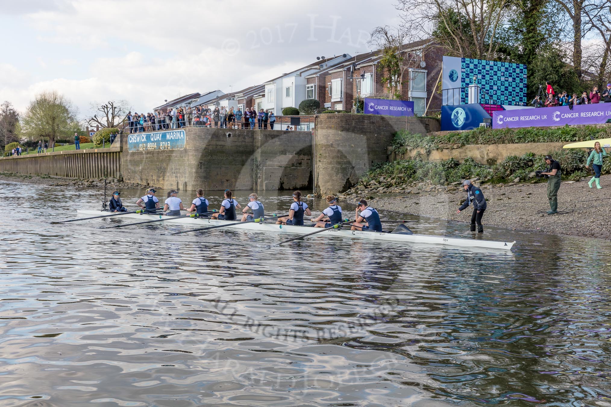 The Boat Race season 2017 -  The Cancer Research Women's Boat Race: As the Cambridge boat is carried away, OUWBC reaches the shore at Mortlake.
River Thames between Putney Bridge and Mortlake,
London SW15,

United Kingdom,
on 02 April 2017 at 17:00, image #212