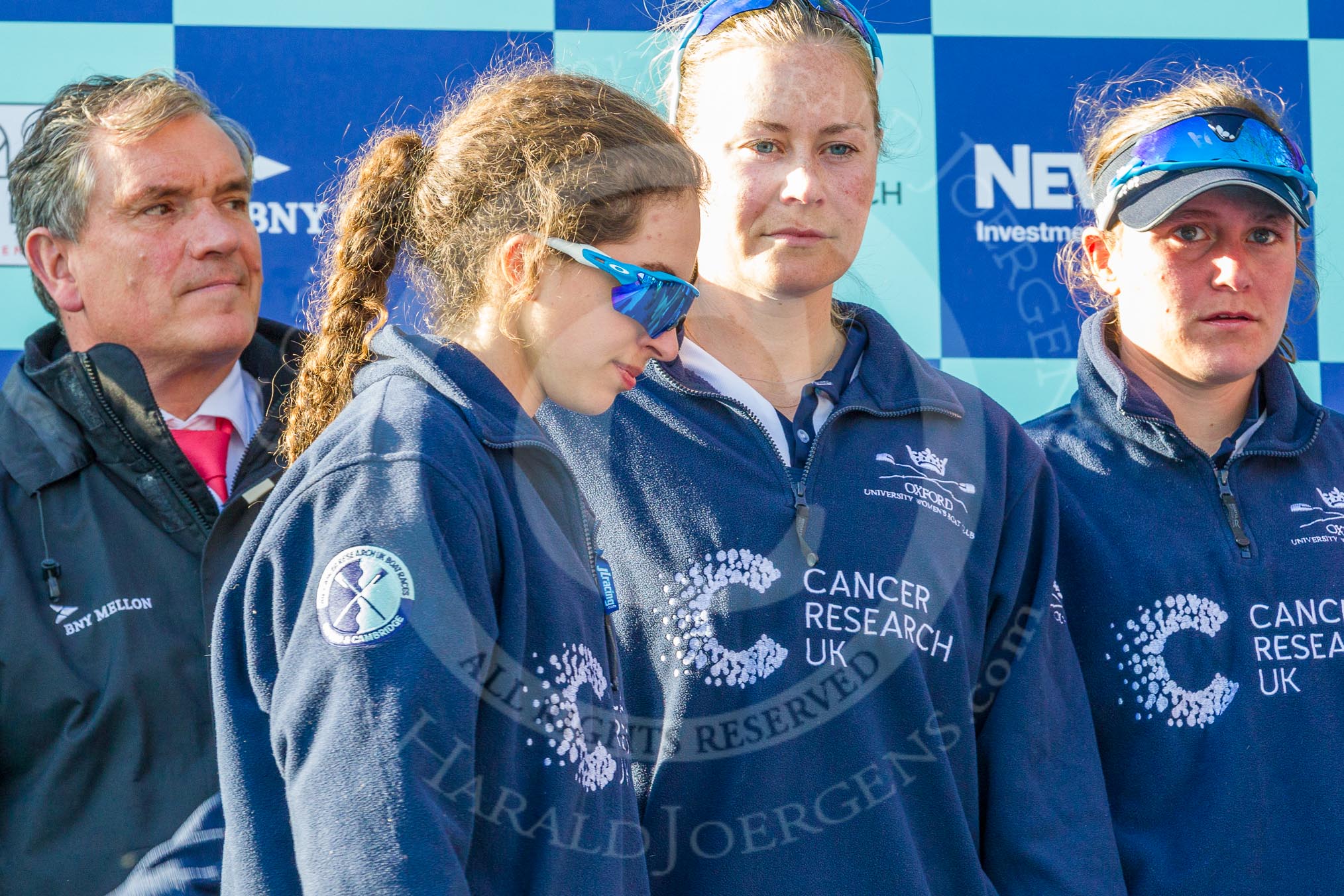 Photo 1704021710061D48395HaraldJoergens The Boat Race season 2017 - The Cancer Research Women's Boat Race: Race Marshall Mitchell E. Harris with OUWBC's cox Eleanor Shearer, stroke Emily Cameron, and 4 seat Rebecca Esselstein at the price giving.
River Thames between Putney Bridge and Mortlake,
London SW15,
United Kingdom,
on 02 April 2017 at 17:10, image #219