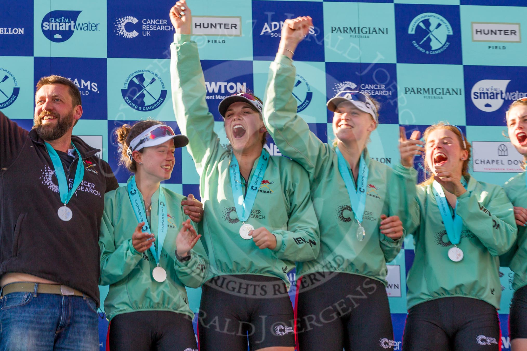 The Boat Race season 2017 -  The Cancer Research Women's Boat Race: A jubilant CUWBC crew at the price giving, on the left their head coach Rob Barker.
River Thames between Putney Bridge and Mortlake,
London SW15,

United Kingdom,
on 02 April 2017 at 17:11, image #231