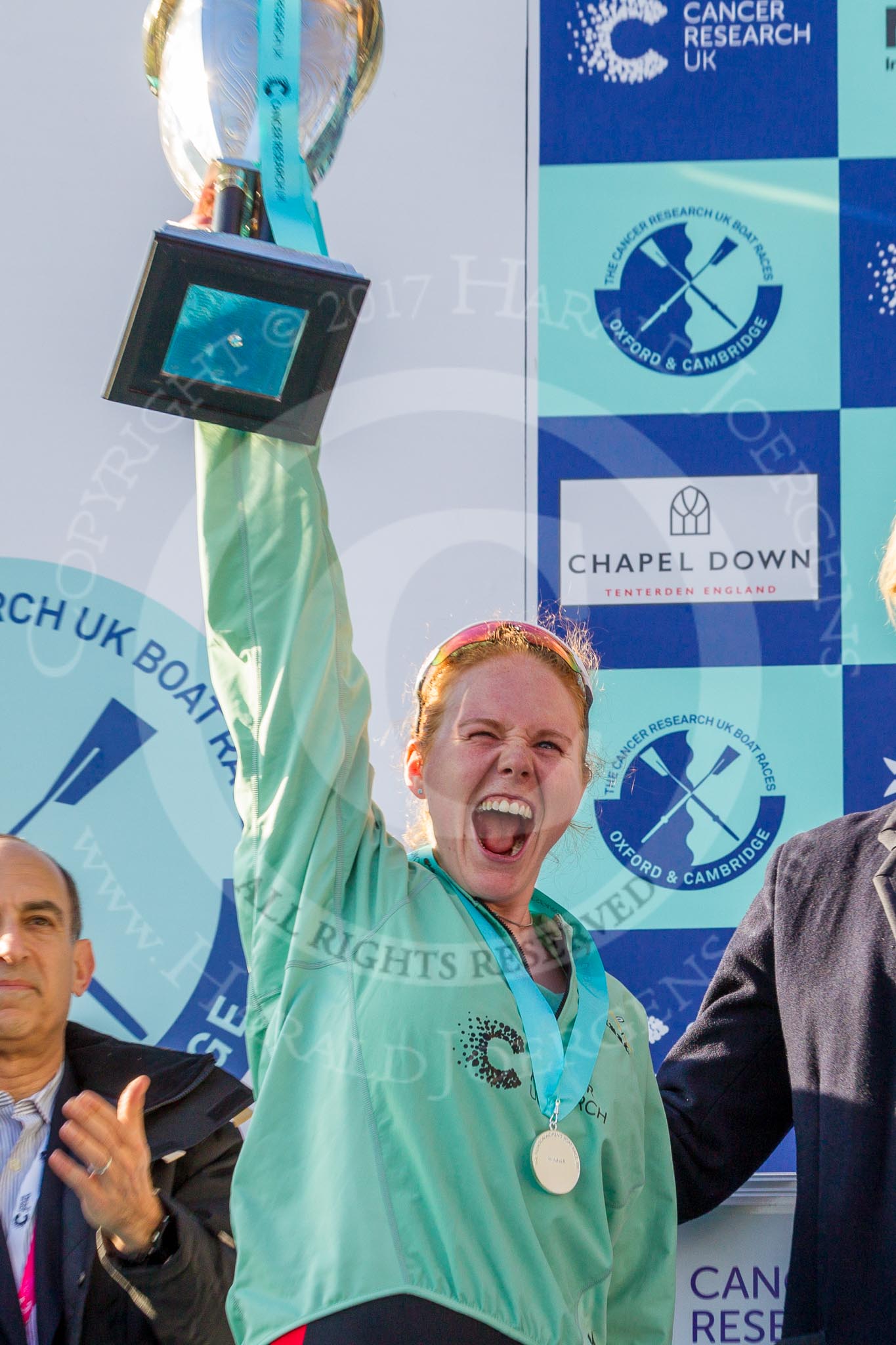 The Boat Race season 2017 -  The Cancer Research Women's Boat Race: A jubilant Ashton Brown with the Women's Boat Race trophy at the price giving.
River Thames between Putney Bridge and Mortlake,
London SW15,

United Kingdom,
on 02 April 2017 at 17:11, image #235