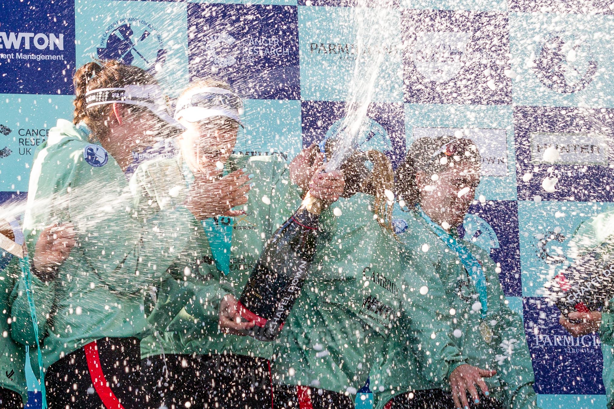 The Boat Race season 2017 -  The Cancer Research Women's Boat Race: CUWBC covered in spray (Cahmpagne, not Thames water) at the price giving.
River Thames between Putney Bridge and Mortlake,
London SW15,

United Kingdom,
on 02 April 2017 at 17:13, image #258