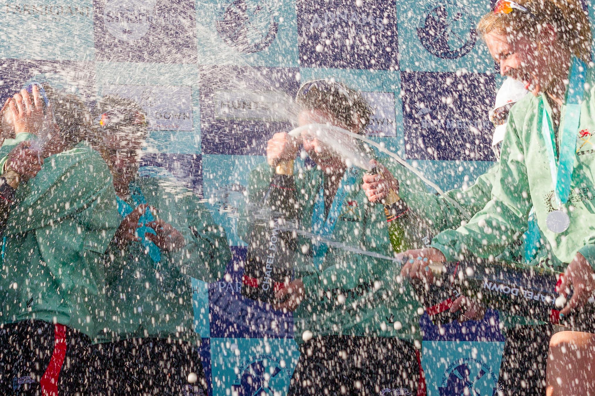 The Boat Race season 2017 -  The Cancer Research Women's Boat Race: CUWBC covered in spray (Cahmpagne, not Thames water) at the price giving.
River Thames between Putney Bridge and Mortlake,
London SW15,

United Kingdom,
on 02 April 2017 at 17:13, image #263