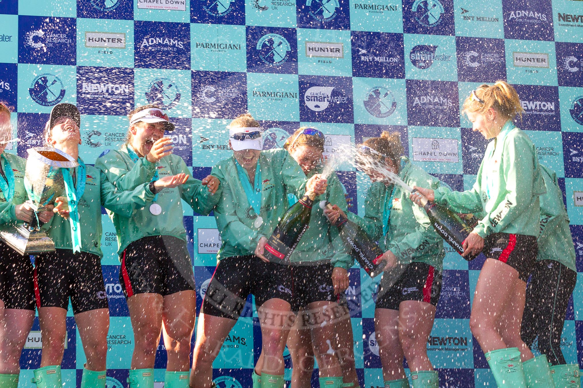 The Boat Race season 2017 -  The Cancer Research Women's Boat Race: CUWBC spraying the Champagne at the price giving.
River Thames between Putney Bridge and Mortlake,
London SW15,

United Kingdom,
on 02 April 2017 at 17:13, image #272