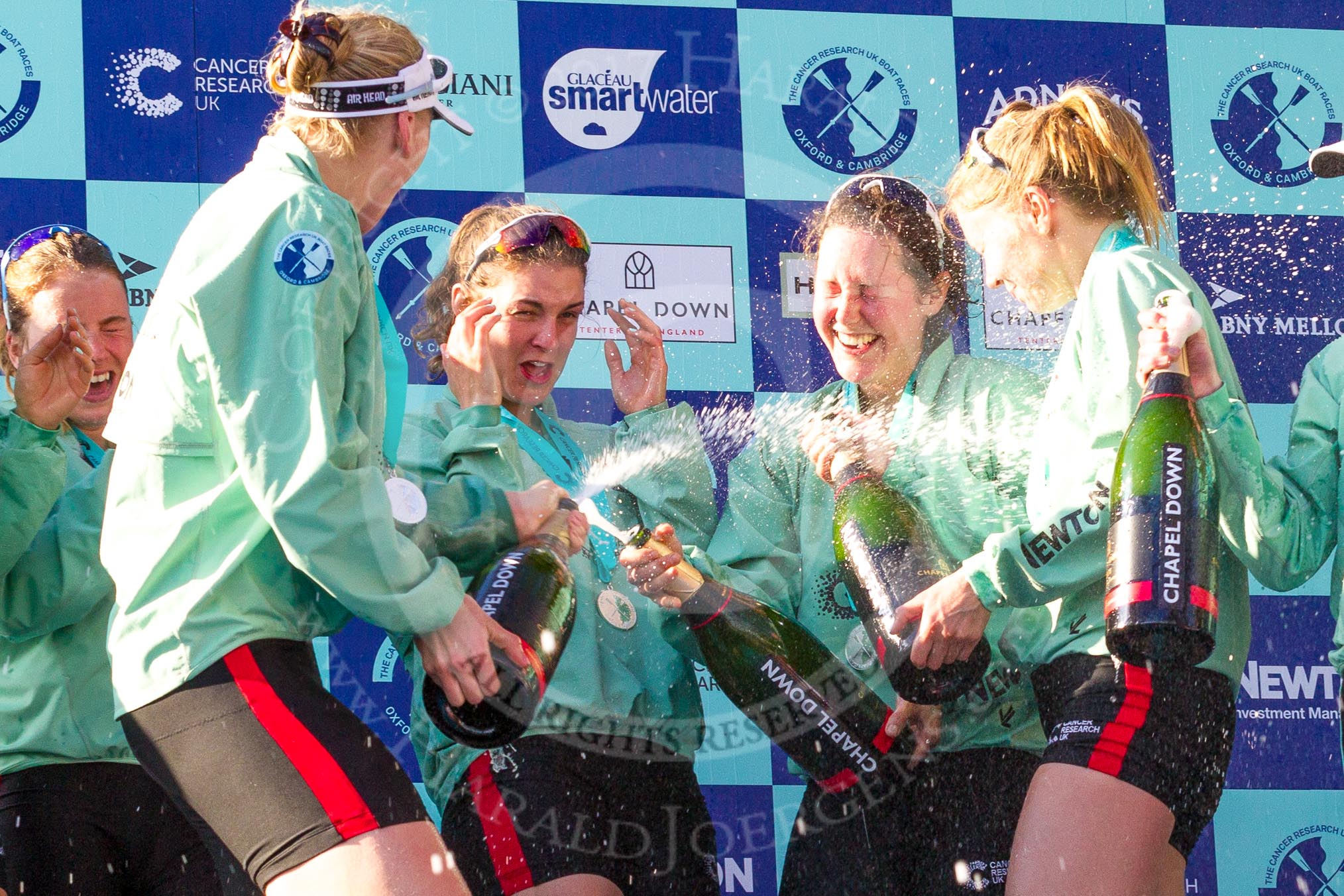 The Boat Race season 2017 -  The Cancer Research Women's Boat Race: CUWBC spraying the Champagne at the price giving.
River Thames between Putney Bridge and Mortlake,
London SW15,

United Kingdom,
on 02 April 2017 at 17:13, image #277
