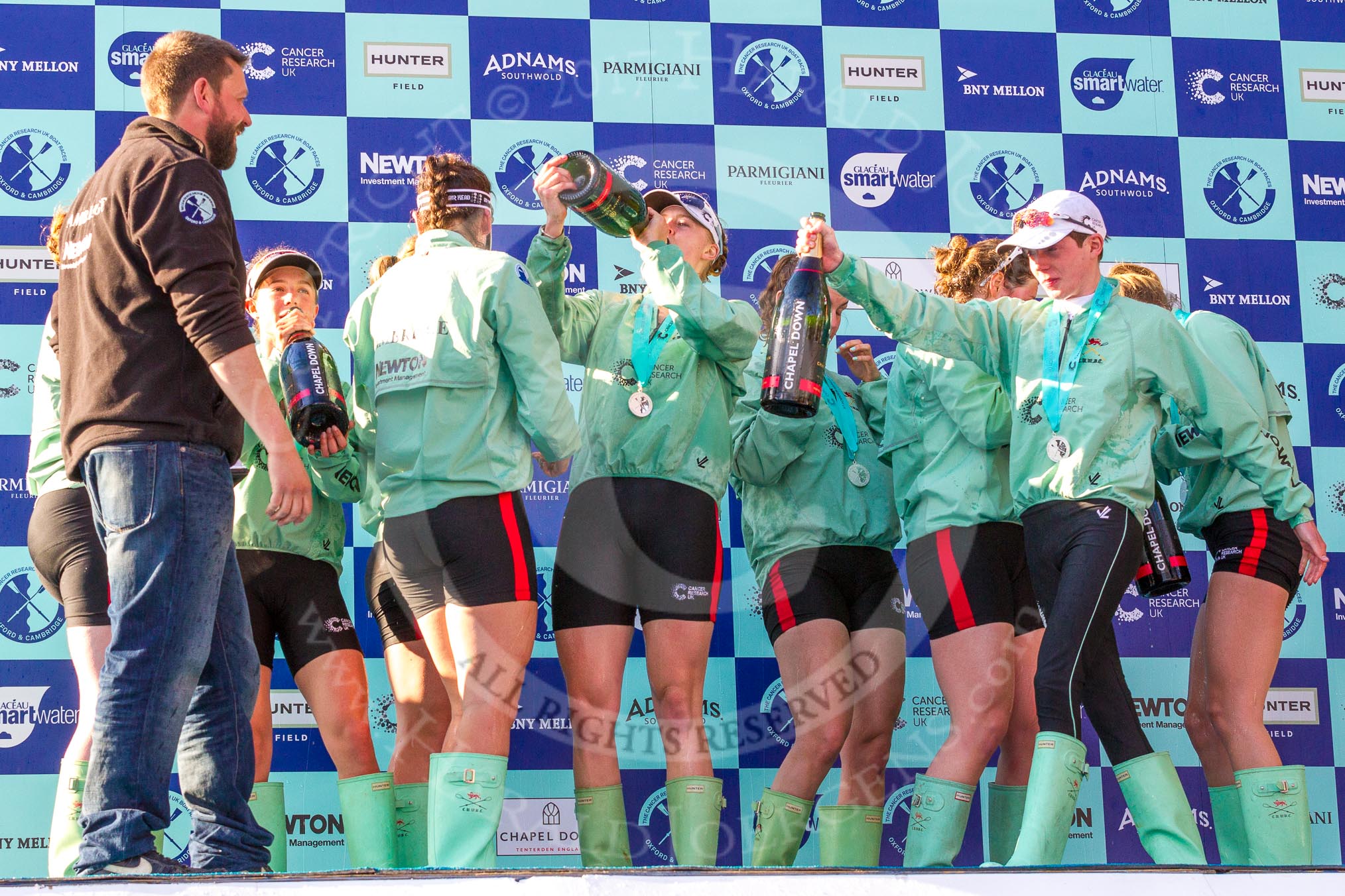 The Boat Race season 2017 -  The Cancer Research Women's Boat Race: CUWBC at the price giving, after spraying four bottles of Chapel Down Champagne.
River Thames between Putney Bridge and Mortlake,
London SW15,

United Kingdom,
on 02 April 2017 at 17:13, image #278