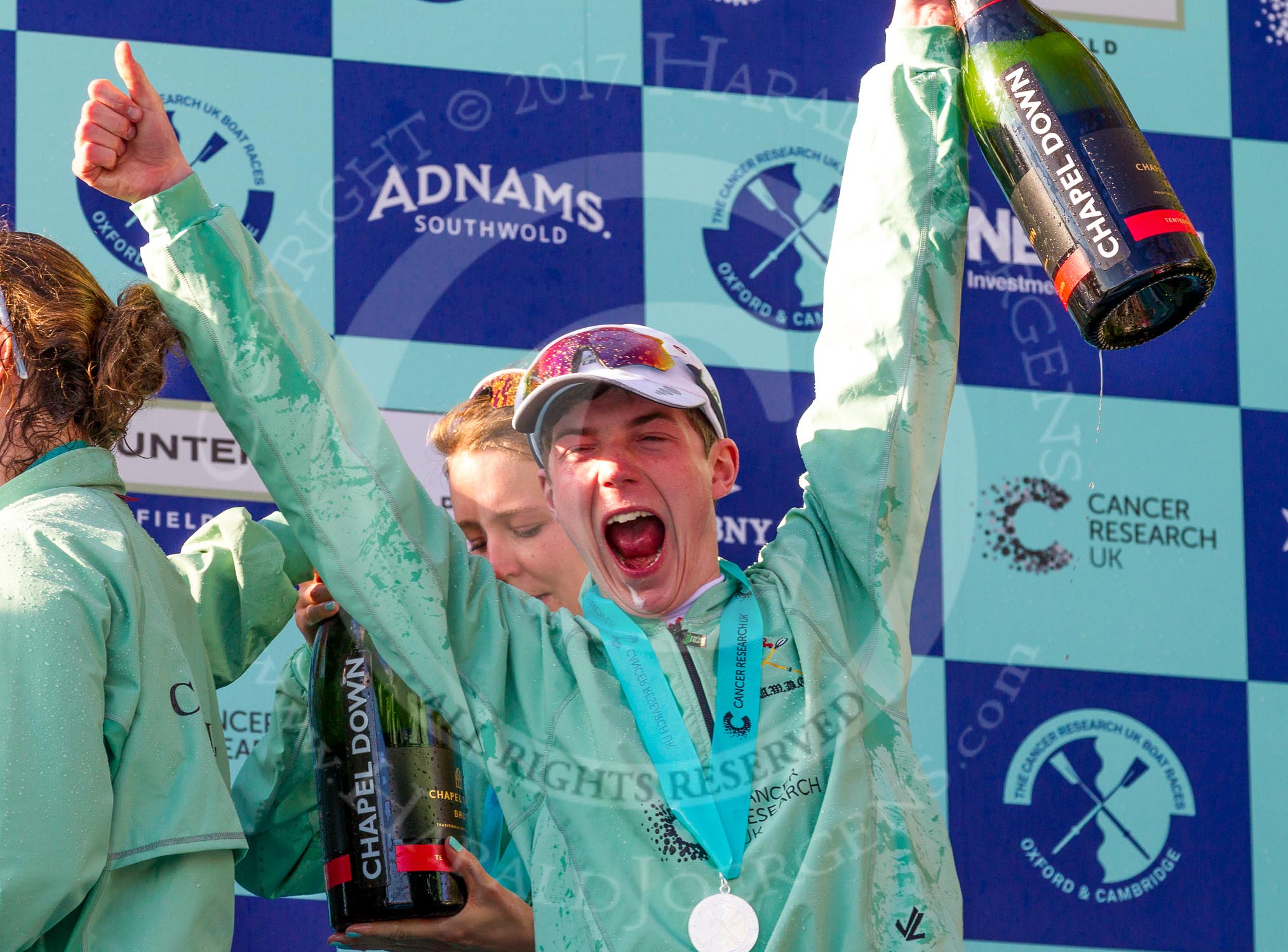 The Boat Race season 2017 -  The Cancer Research Women's Boat Race: Jubilant CUWBC cox Matthew Holland at the price giving.
River Thames between Putney Bridge and Mortlake,
London SW15,

United Kingdom,
on 02 April 2017 at 17:13, image #286