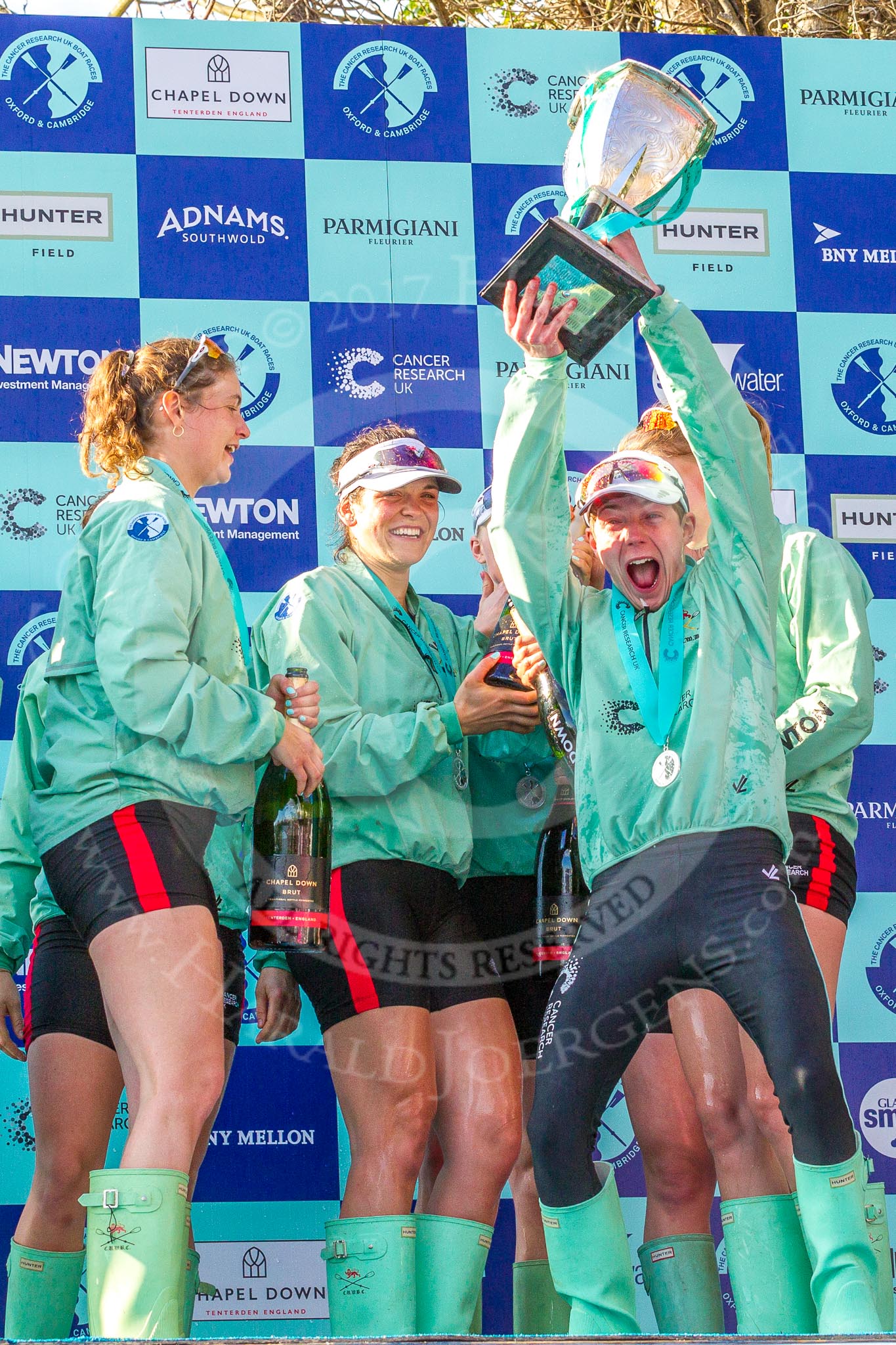 The Boat Race season 2017 -  The Cancer Research Women's Boat Race: CUWBC with the Womwn's Boat Race trophy at the price giving - and a very excited cox Matthew Holland with the Women's Boat Race trophy.
River Thames between Putney Bridge and Mortlake,
London SW15,

United Kingdom,
on 02 April 2017 at 17:14, image #296