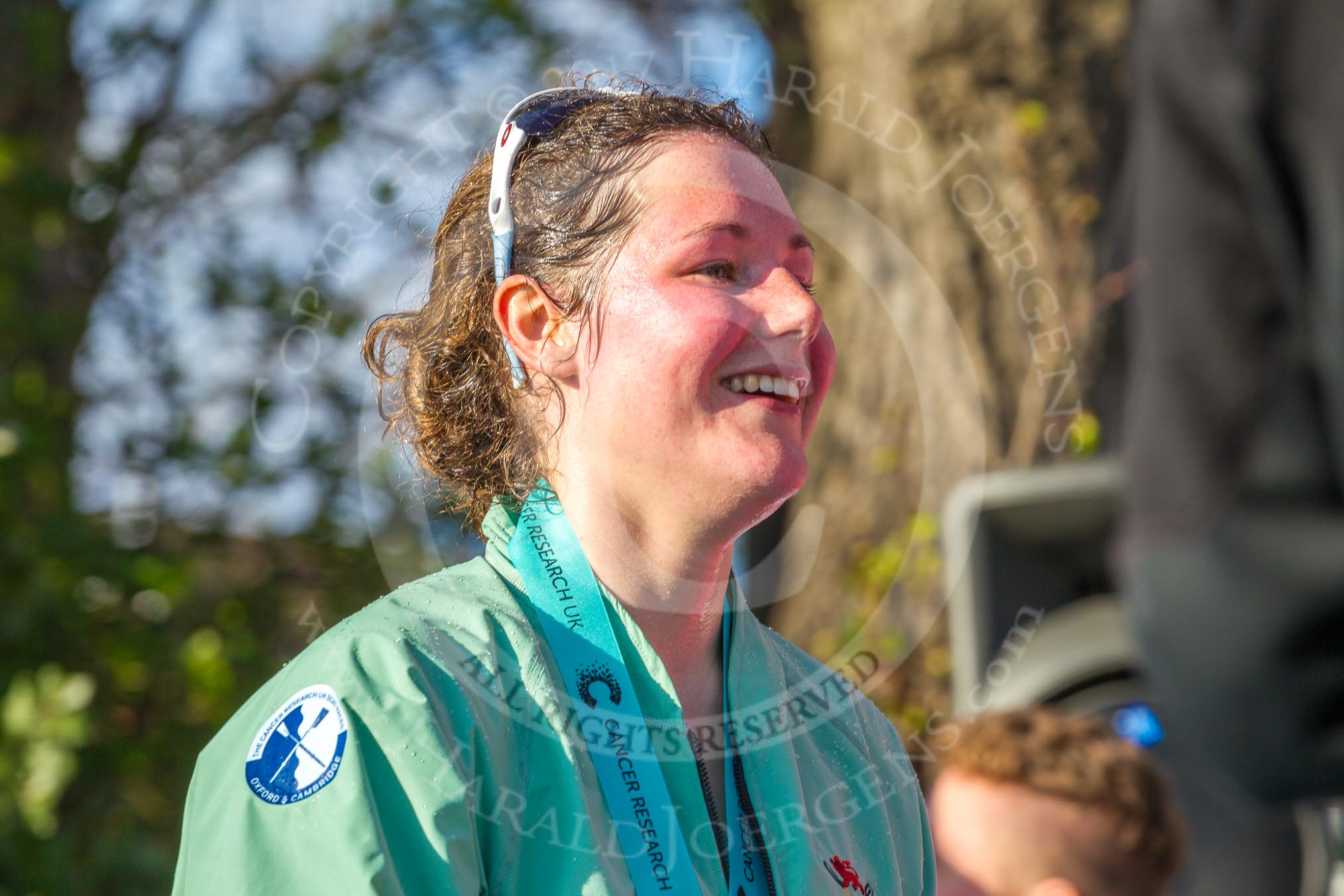 Photo 1704021714251D48761HaraldJoergens The Boat Race season 2017 - The Cancer Research Women's Boat Race: CUWBC stroke Melissa Wilson, with lots of Champagne, leaving the price giving.
River Thames between Putney Bridge and Mortlake,
London SW15,
United Kingdom,
on 02 April 2017 at 17:14, image #303