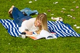 The Boat Race season 2017 -  The Cancer Research Women's Boat Race: A young lady enjoying the sunshine on Boat Race day at Bishop's Park.
River Thames between Putney Bridge and Mortlake,
London SW15,

United Kingdom,
on 02 April 2017 at 13:32, image #5