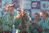 The Boat Race season 2017 -  The Cancer Research Women's Boat Race: CUWBC covered in spray (Cahmpagne, not Thames water) at the price giving.
River Thames between Putney Bridge and Mortlake,
London SW15,

United Kingdom,
on 02 April 2017 at 17:13, image #269