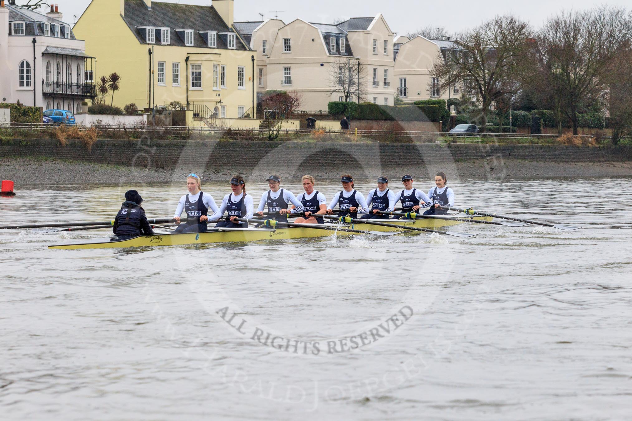 The Boat Race season 2018 - Women's Boat Race Trial Eights (OUWBC, Oxford): "Coursing River" about to cross the finish line, here cox Ellie Shearer, stroke Beth Bridgman, 7 Juliette Perry, 6 Katherine Erickson, 5 Morgan McGovern, 4 Anna Murgatroyd, 3 Stefanie Zekoll, 2 Rachel Anderson, bow Sarah Payne-Riches.
River Thames between Putney Bridge and Mortlake,
London SW15,

United Kingdom,
on 21 January 2018 at 14:46, image #171