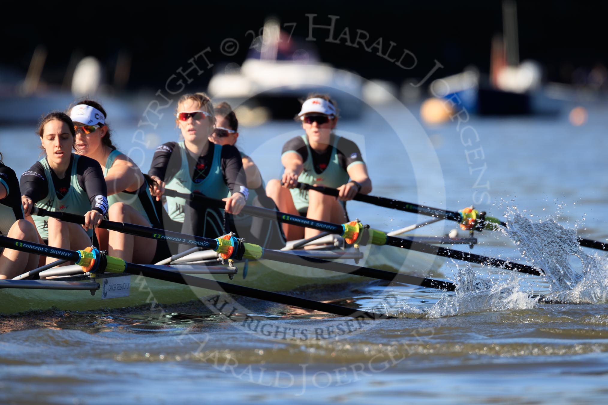 The Women's Boat Race season 2018 - fixture CUWBC vs. ULBC: CUWBC extending their lead near the Putney boat houses, here 6 Anne Beenken, 5 Thea Zabell, 4 Paula Wesselmann, 3 Alice White, 2 Myriam Goudet-Boukhatmi, bow Olivia Coffey.
River Thames between Putney Bridge and Mortlake,
London SW15,

United Kingdom,
on 17 February 2018 at 13:10, image #52