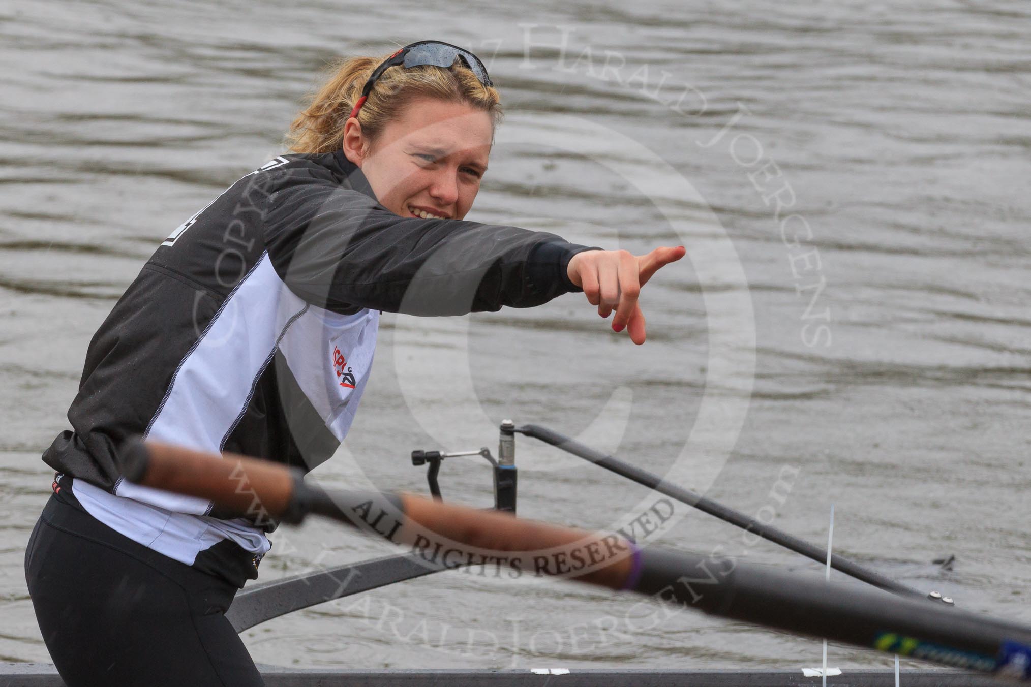 The Women's Boat Race season 2018 - fixture OUWBC vs. Molesey BC: Molesey stroke Katie Bartlett pointing.
River Thames between Putney Bridge and Mortlake,
London SW15,

United Kingdom,
on 04 March 2018 at 13:08, image #10