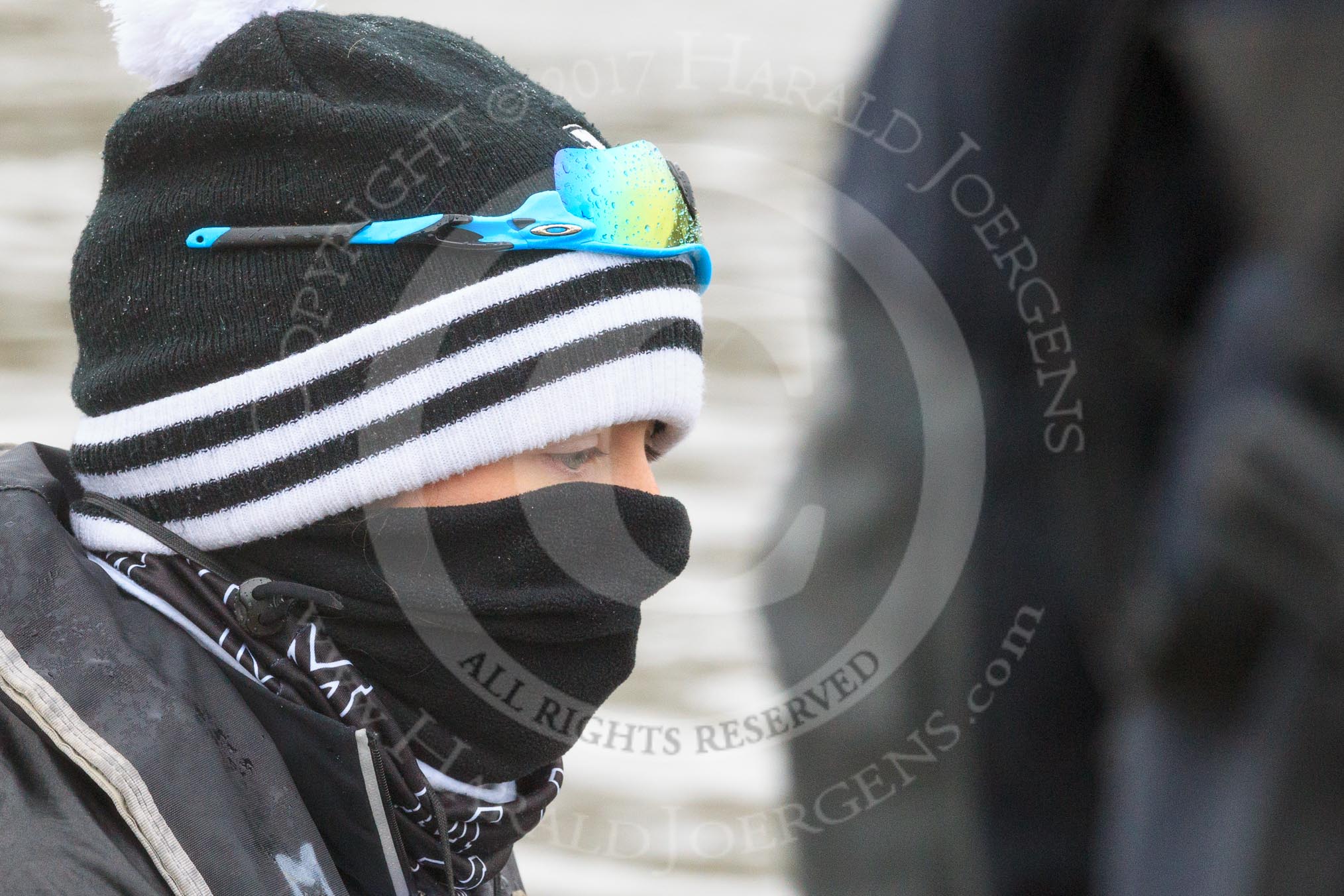 The Women's Boat Race season 2018 - fixture OUWBC vs. Molesey BC: Molesey cox Ella Taylor prepared for the weather.
River Thames between Putney Bridge and Mortlake,
London SW15,

United Kingdom,
on 04 March 2018 at 13:10, image #24