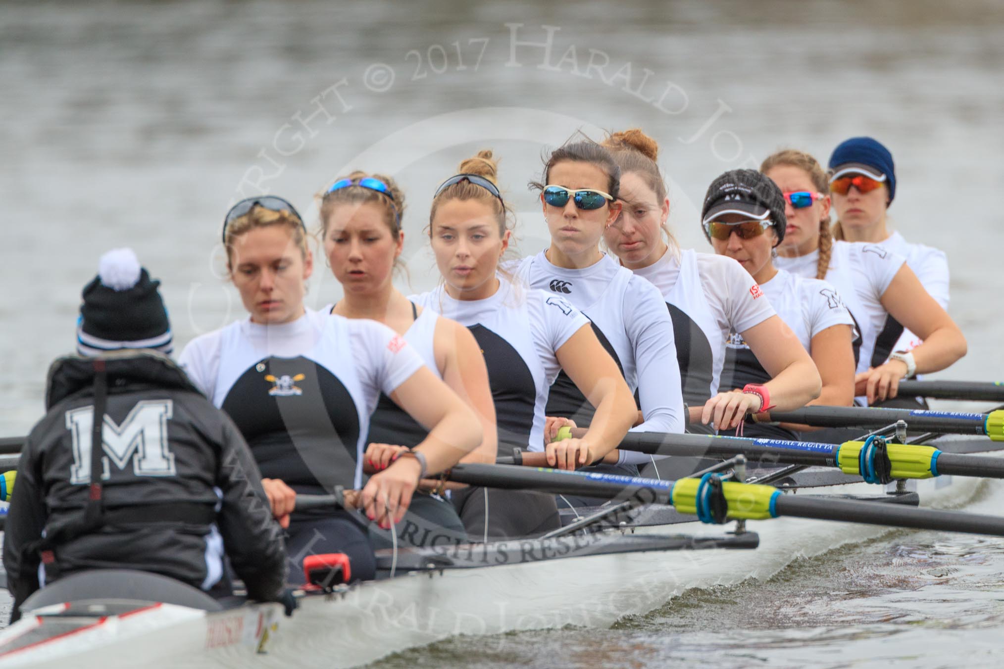Photo 1803041343071X23299HaraldJoergens The Women's Boat Race season 2018 - fixture OUWBC vs. Molesey BC: Molesey rowing to the start at Putney Bridge: Cox Ella Taylor, stroke Katie Bartlett, 7 Emma McDonald, 6 Molly Harding, 5 Ruth Whyman, 4 Claire McKeown, 3 Gabby Rodriguez, 2 Lucy Primmer, bow Emma Boyns.
River Thames between Putney Bridge and Mortlake,
London SW15,
United Kingdom,
on 04 March 2018 at 13:43, image #42