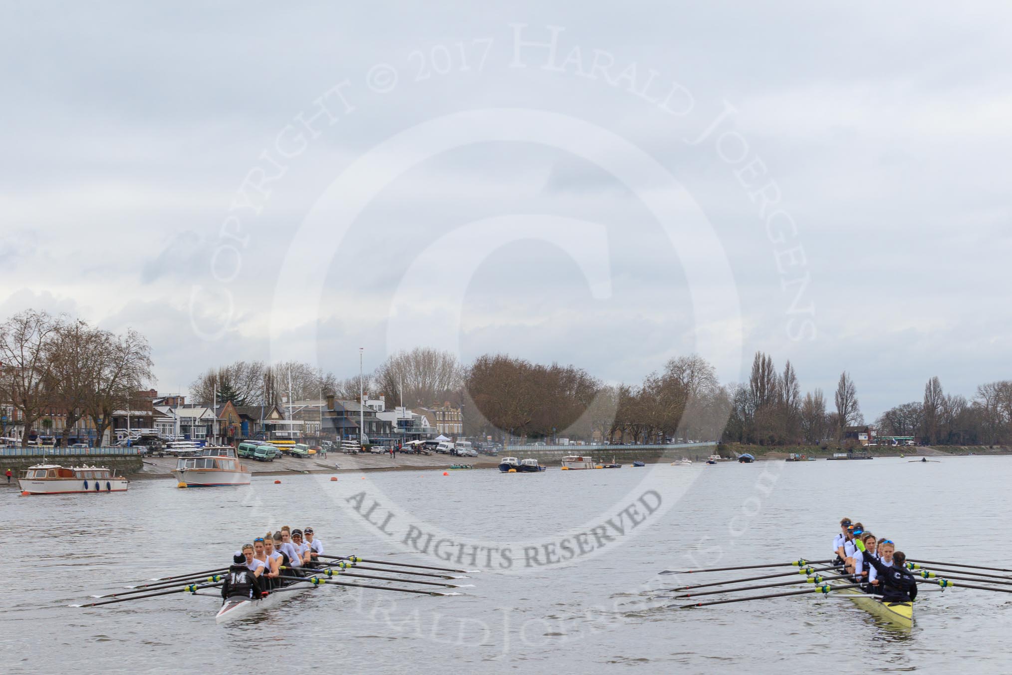 The Women's Boat Race season 2018 - fixture OUWBC vs. Molesey BC: Molesey (left) and OUWBC ready for the start of the race at Putney Bridge.
River Thames between Putney Bridge and Mortlake,
London SW15,

United Kingdom,
on 04 March 2018 at 13:44, image #45