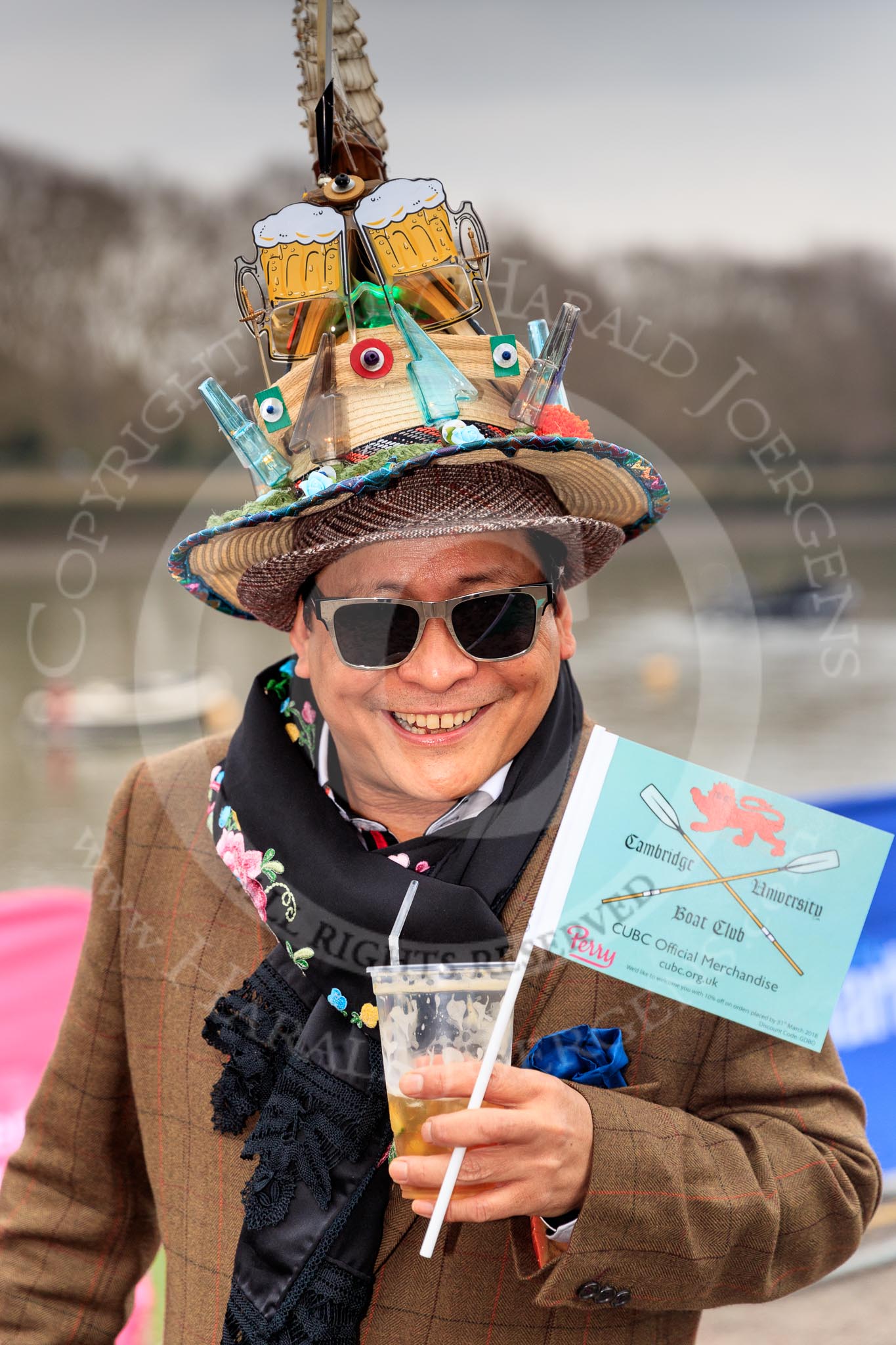 The Cancer Research UK Women's Boat Race 2018: This gentleman must be a hardcore Boat Race fan - he seems to be there every year (nad is difficult to miss).
River Thames between Putney Bridge and Mortlake,
London SW15,

United Kingdom,
on 24 March 2018 at 14:22, image #27