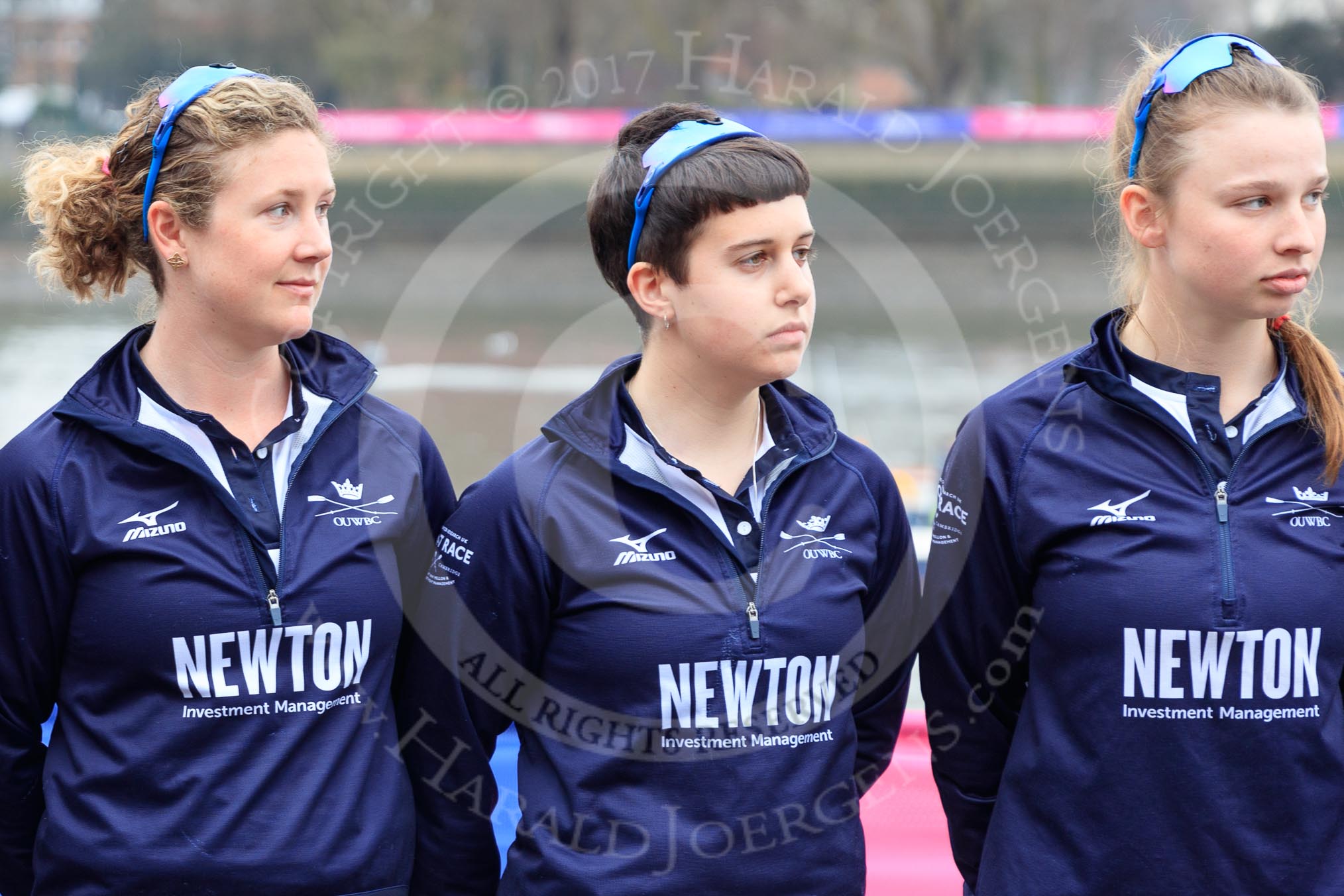 The Cancer Research UK Women's Boat Race 2018: Oxford women at the toss - 5 seat Morgan McGovern, 4 Alice Roberts, and 3 Juliette Perry.
River Thames between Putney Bridge and Mortlake,
London SW15,

United Kingdom,
on 24 March 2018 at 14:40, image #37