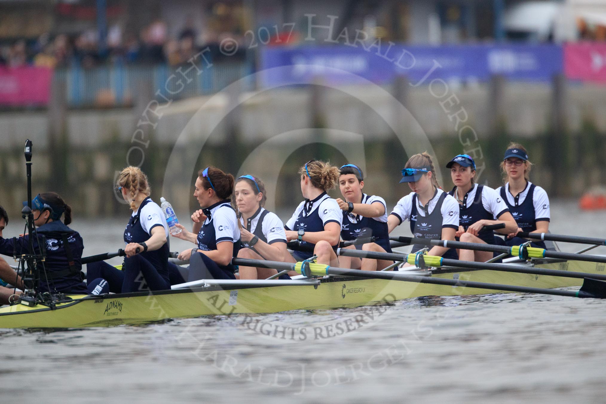 Photo 1803241628041X24429HaraldJoergens The Cancer Research UK Women's Boat Race 2018: The Oxford women getting ready for the start of the Women's Boat Race - cox Jessica Buck, stroke Beth Bridgman, 7 Abigail Killen, 6 Sara Kushma, 5 Morgan McGovern, 4 Alice Roberts, 3 Juliette Perry, 2 Katherine Erickson, bow Renée Koolschijn.
River Thames between Putney Bridge and Mortlake,
London SW15,
United Kingdom,
on 24 March 2018 at 16:28, image #154