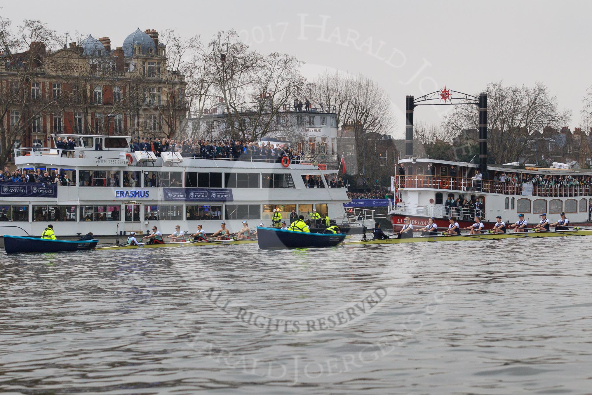 The Cancer Research UK Women's Boat Race 2018: The Oxford and Cambridge Blue Boats wit the stake boatsm ready for the start of the race.
River Thames between Putney Bridge and Mortlake,
London SW15,

United Kingdom,
on 24 March 2018 at 16:31, image #162