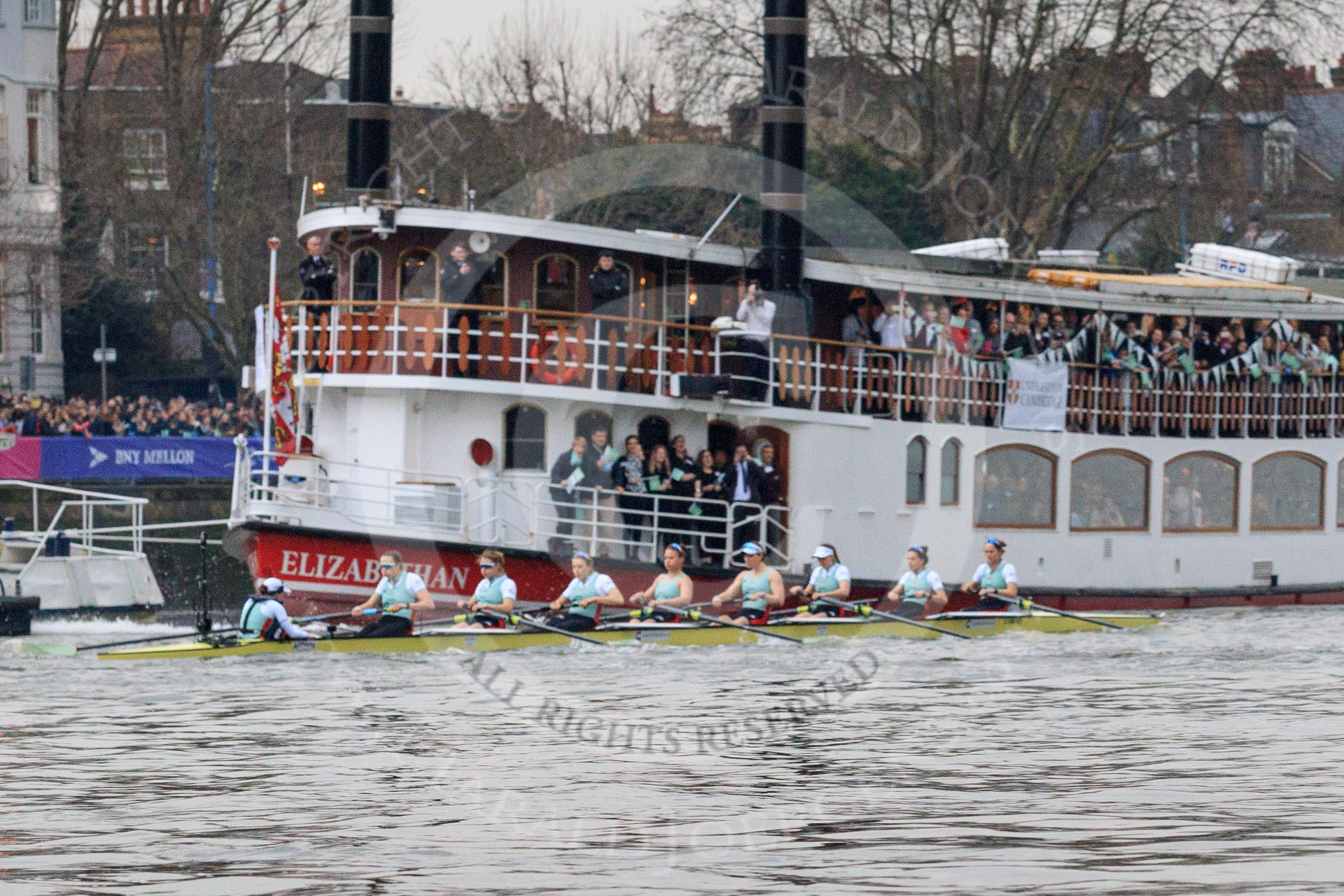 The Cancer Research UK Women's Boat Race 2018: The Cambridge Blue Boat, seconds after the start of the race, passing the Cambridge supporters Thames ship Elizabethan.
River Thames between Putney Bridge and Mortlake,
London SW15,

United Kingdom,
on 24 March 2018 at 16:31, image #166