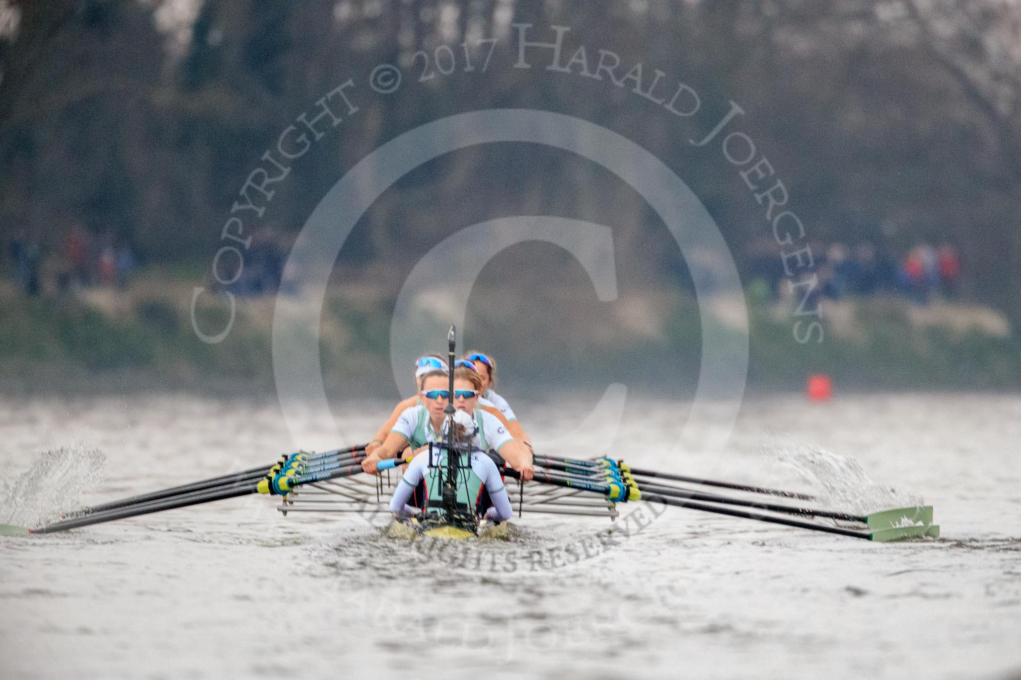 The Cancer Research UK Women's Boat Race 2018: The Cambridge Blue Boat, near the Mile Post, and ahead of Oxford. Cox Sophie Shapter, stroke Olivia Coffey, 7 Myriam Goudet-Boukhatmi, 6 Alice White, 5 Paula Wesselmann, 4 Thea Zabell, 3 Kelsey Barolak, 2	Imogen Grant, bow Tricia Smith.
River Thames between Putney Bridge and Mortlake,
London SW15,

United Kingdom,
on 24 March 2018 at 16:33, image #169