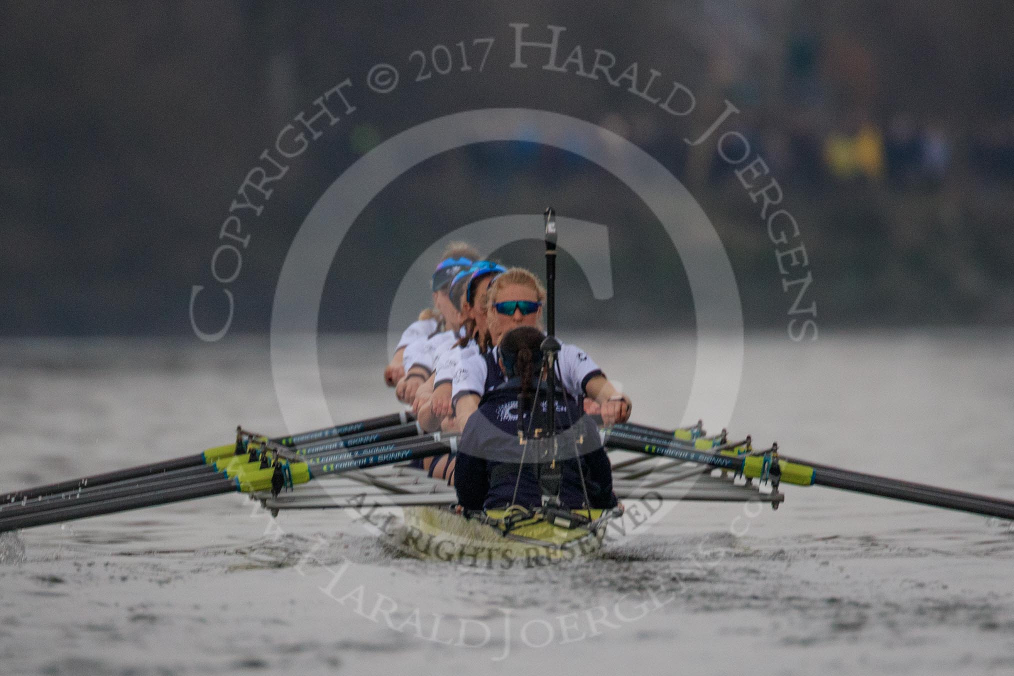 The Cancer Research UK Women's Boat Race 2018: The Oxford Blue Boat chasing Cambridge near Craven Cottage - cox Jessica Buck, stroke Beth Bridgman, 7 Abigail Killen, 6 Sara Kushma, 5 Morgan McGovern, 4 Alice Roberts, 3 Juliette Perry, 2 Katherine Erickson, bow Renée Koolschijn.
River Thames between Putney Bridge and Mortlake,
London SW15,

United Kingdom,
on 24 March 2018 at 16:34, image #170