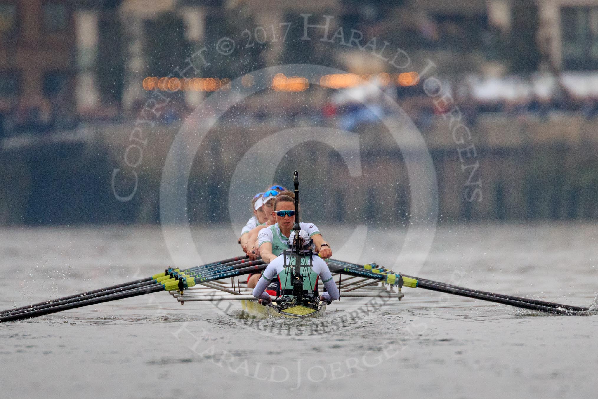 Photo 1803241636211X24586HaraldJoergens The Cancer Research UK Women's Boat Race 2018: The Cambridge Blue Boat extending the lead over Oxford - bow Tricia Smith, 2 Imogen Grant, 3 Kelsey Barolak, 4 Thea Zabell, 5 Paula Wesselmann, 6 Alice White, 7 Myriam Goudet-Boukhatmi, stroke Olivia Coffey, cox Sophie Shapter.
River Thames between Putney Bridge and Mortlake,
London SW15,
United Kingdom,
on 24 March 2018 at 16:36, image #174