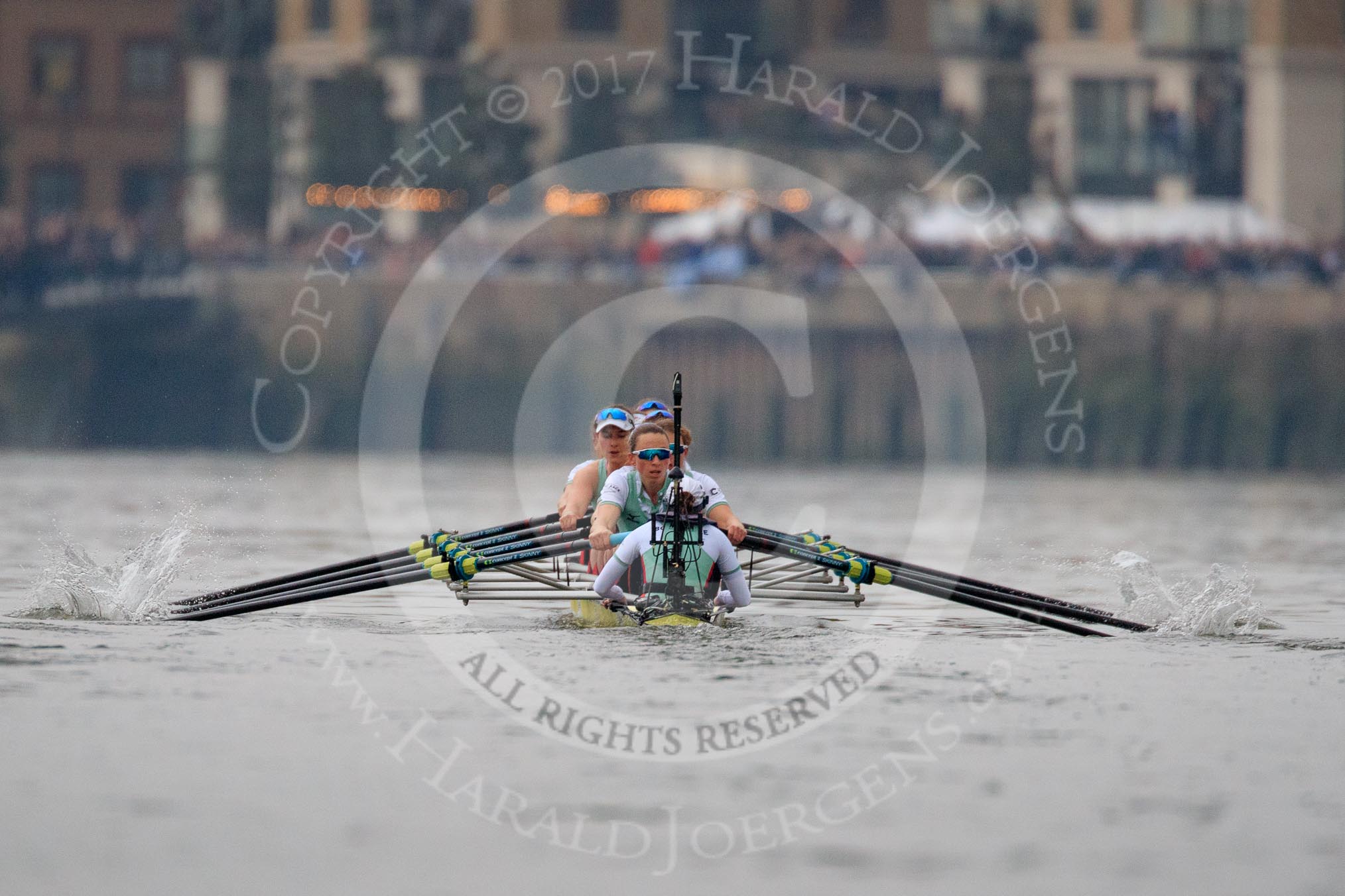 Photo 1803241636231X24593HaraldJoergens The Cancer Research UK Women's Boat Race 2018: The Cambridge Blue Boat extending the lead over Oxford - bow Tricia Smith, 2 Imogen Grant, 3 Kelsey Barolak, 4 Thea Zabell, 5 Paula Wesselmann, 6 Alice White, 7 Myriam Goudet-Boukhatmi, stroke Olivia Coffey, cox Sophie Shapter.
River Thames between Putney Bridge and Mortlake,
London SW15,
United Kingdom,
on 24 March 2018 at 16:36, image #175