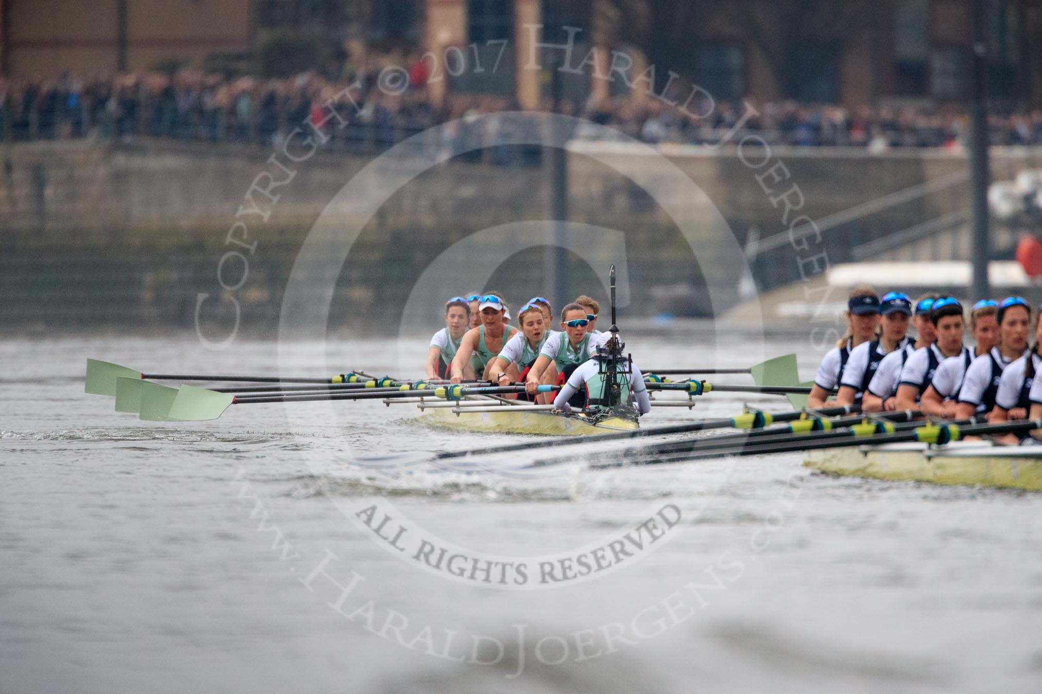The Cancer Research UK Women's Boat Race 2018: Having a clear view of the leading Cambridge boat was quite rare during this years race. Bow Tricia Smith, 2 Imogen Grant, 3 Kelsey Barolak, 4 Thea Zabell, 5 Paula Wesselmann, 6 Alice White, 7 Myriam Goudet-Boukhatmi, stroke	Olivia Coffey, cox Sophie Shapter.
River Thames between Putney Bridge and Mortlake,
London SW15,

United Kingdom,
on 24 March 2018 at 16:37, image #178
