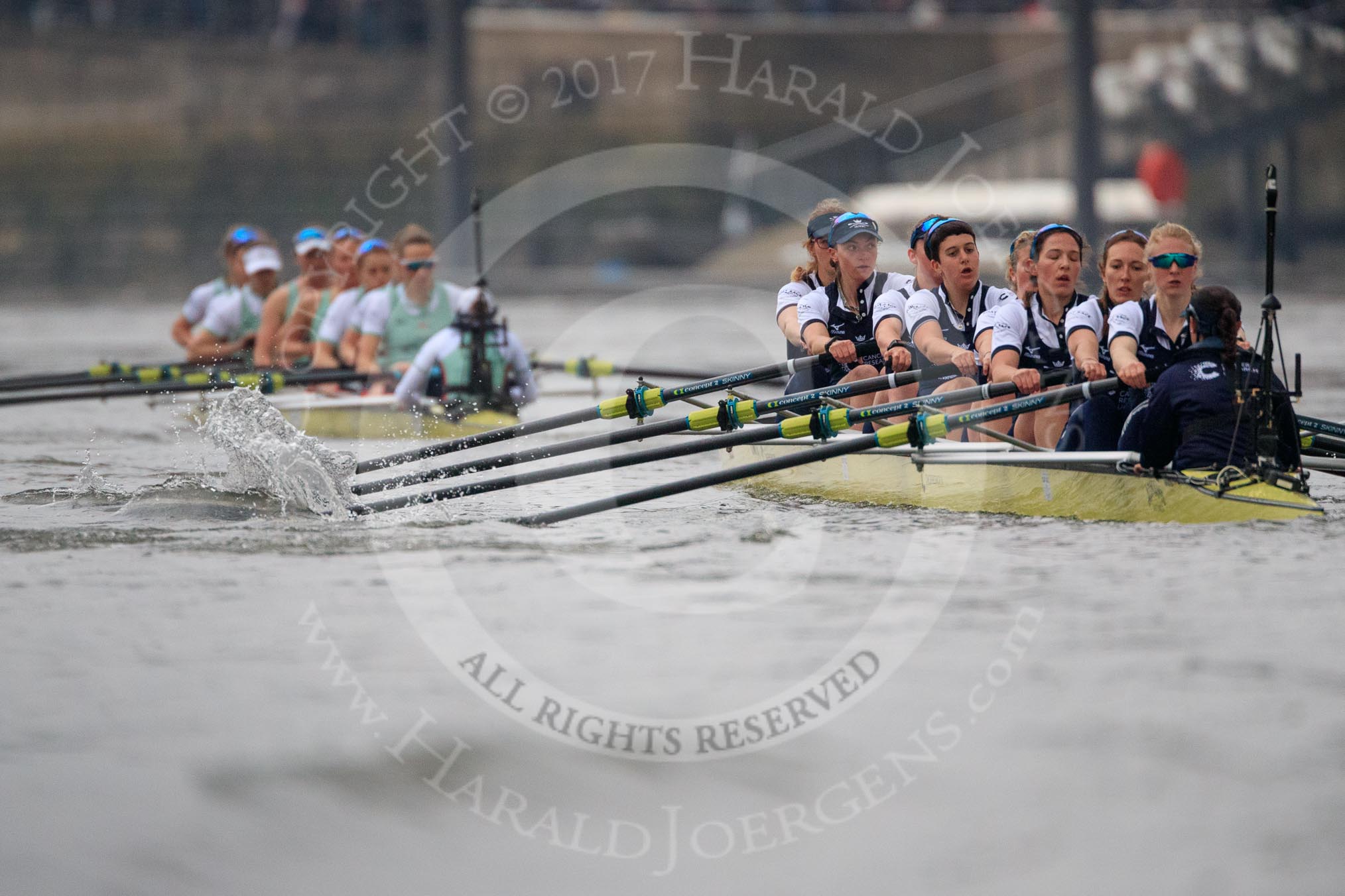 Photo 1803241637151X24626HaraldJoergens The Cancer Research UK Women's Boat Race 2018: Cambridge is getting away - near Harrods Repository, in the Oxford boat bow Renée Koolschijn, 2 Katherine Erickson, 3 Juliette Perry, 4 Alice Roberts, 5 Morgan McGovern, 6 Sara Kushma, 7 Abigail Killen, stroke Beth Bridgman, cox Jessica Buck.
River Thames between Putney Bridge and Mortlake,
London SW15,
United Kingdom,
on 24 March 2018 at 16:37, image #179