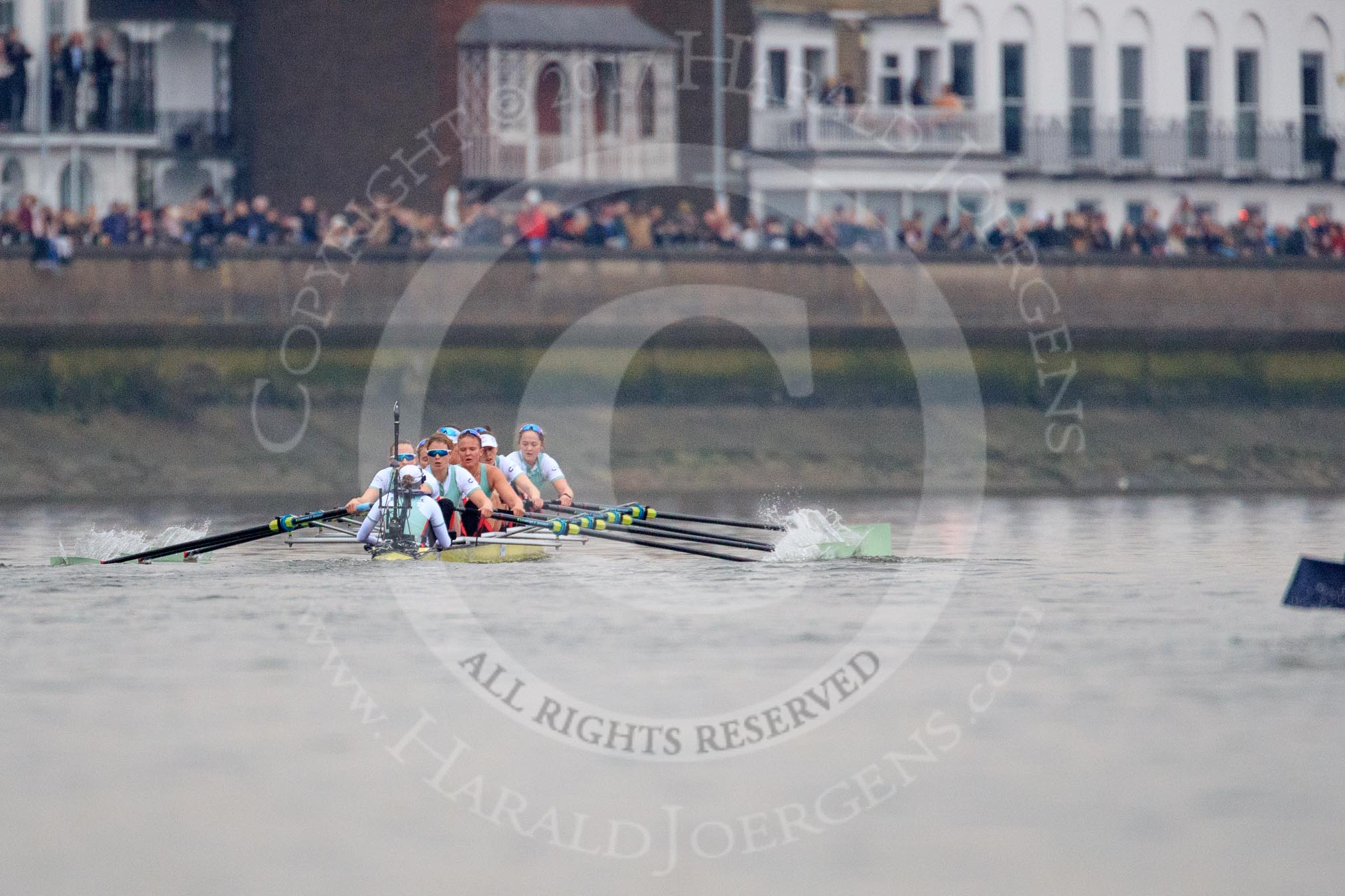 The Cancer Research UK Women's Boat Race 2018: The trailing Oxford boat can just be seen on the right as the Cambridge women extend their lead. Here near the Bandstand, in the Cambridge boat bow Tricia Smith, 2 Imogen Grant, 3 Kelsey Barolak, 4 Thea Zabell, 5 Paula Wesselmann, 6 Alice White, 7 Myriam Goudet-Boukhatmi, stroke Olivia Coffey, cox Sophie Shapter.
River Thames between Putney Bridge and Mortlake,
London SW15,

United Kingdom,
on 24 March 2018 at 16:45, image #190