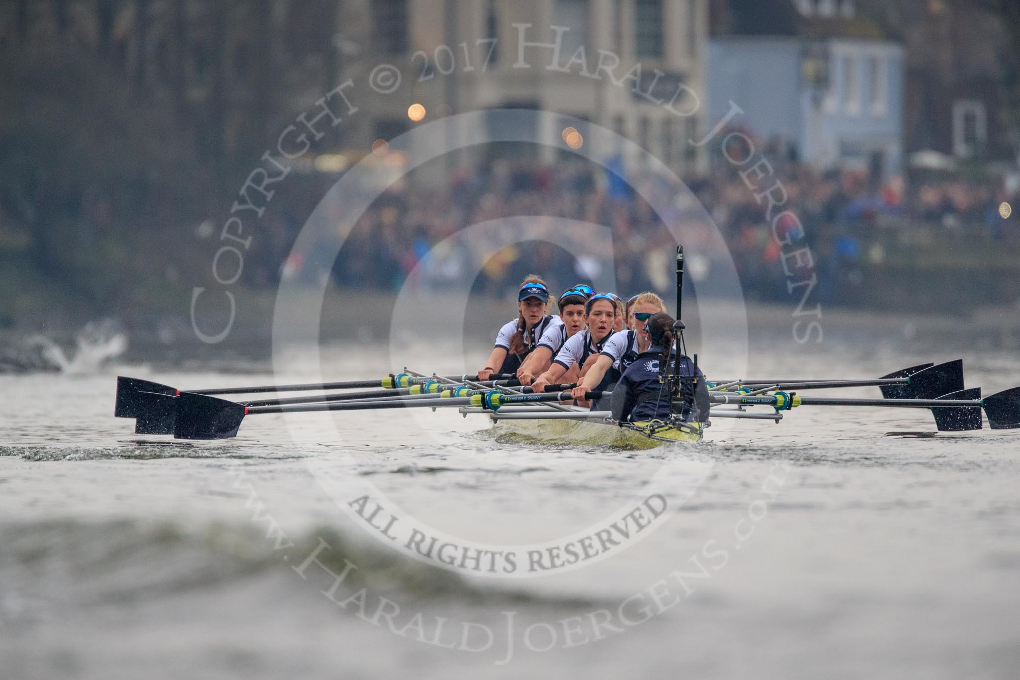 The Cancer Research UK Women's Boat Race 2018: The Oxford boat getting closer to the finish line - bow Renée Koolschijn, 2 Katherine Erickson, 3 Juliette Perry, 4 Alice Roberts, 5 Morgan McGovern, 6 Sara Kushma, 7 Abigail Killen, stroke Beth Bridgman, cox Jessica Buck.
River Thames between Putney Bridge and Mortlake,
London SW15,

United Kingdom,
on 24 March 2018 at 16:49, image #204
