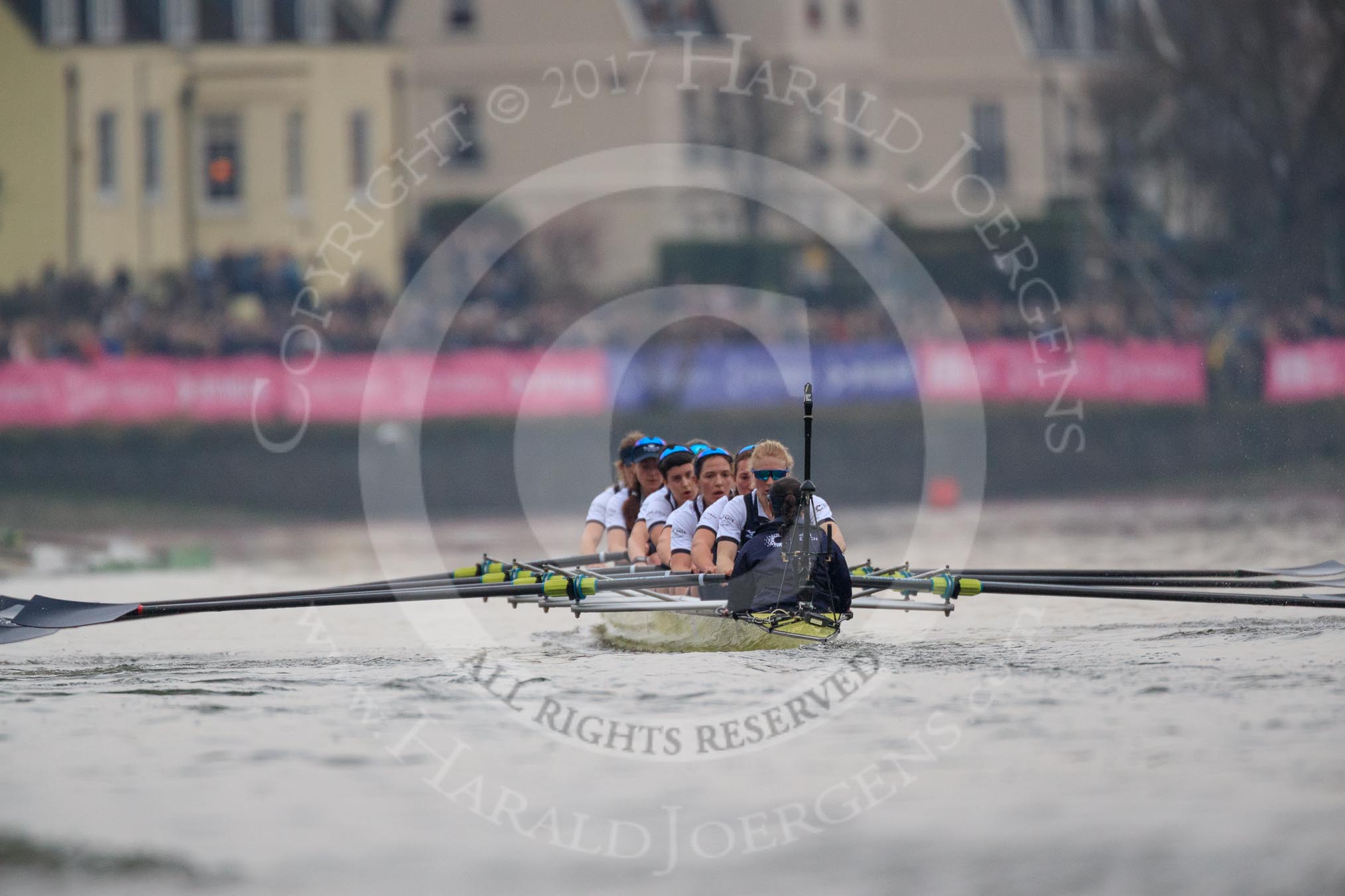 The Cancer Research UK Women's Boat Race 2018: The Oxford boat getting closer to the finish line - bow Renée Koolschijn, 2 Katherine Erickson, 3 Juliette Perry, 4 Alice Roberts, 5 Morgan McGovern, 6 Sara Kushma, 7 Abigail Killen, stroke Beth Bridgman, cox Jessica Buck.
River Thames between Putney Bridge and Mortlake,
London SW15,

United Kingdom,
on 24 March 2018 at 16:49, image #205