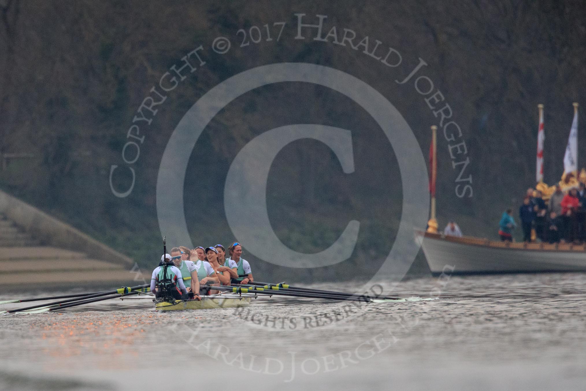 The Cancer Research UK Women's Boat Race 2018: Cambridge has just won the 2018 Women's Boat race, time for the celebrations to start! Cox Sophie Shapter, stroke Olivia Coffey, 7 Myriam Goudet-Boukhatmi, 6 Alice White, 5 Paula Wesselmann, 4 Thea Zabell, 3 Kelsey Barolak, 2 Imogen Grant, bow Tricia Smith. In the background the Queen's rowbarge Gloriana.
River Thames between Putney Bridge and Mortlake,
London SW15,

United Kingdom,
on 24 March 2018 at 16:50, image #217