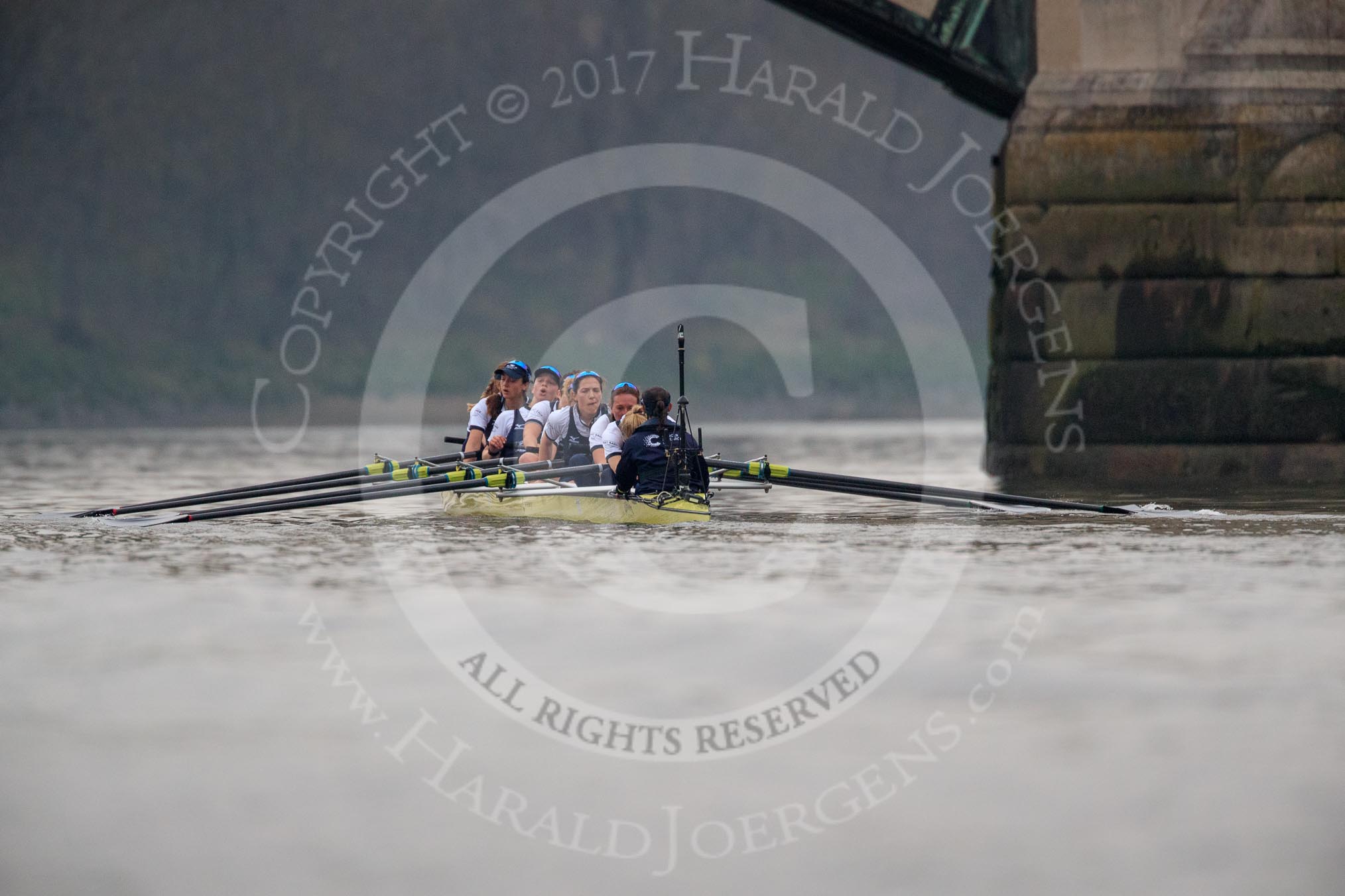 Photo 1803241650561X25096HaraldJoergens The Cancer Research UK Women's Boat Race 2018: The Oxford women passing the second line as second - bow Renée Koolschijn, 2 Katherine Erickson, 3 Juliette Perry, 4 Alice Roberts, 5 Morgan McGovern, 6 Sara Kushma, 7 Abigail Killen, stroke Beth Bridgman, cox Jessica Buck.
River Thames between Putney Bridge and Mortlake,
London SW15,
United Kingdom,
on 24 March 2018 at 16:50, image #219