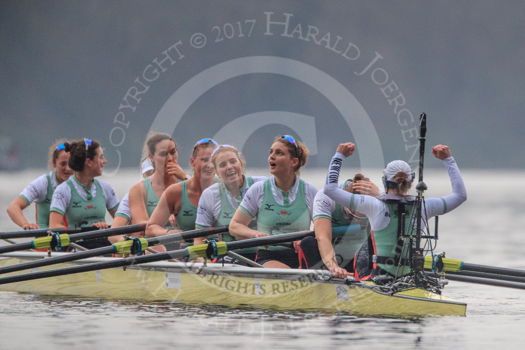 The Cancer Research UK Women's Boat Race 2018: The Cambridge women celebrating their win - bow Tricia Smith, 2 Imogen Grant, 3 Kelsey Barolak, 4 Thea Zabell, 5 Paula Wesselmann, 6 Alice White, 7 Myriam Goudet-Boukhatmi, stroke Olivia Coffey, cox Sophie Shapter.
River Thames between Putney Bridge and Mortlake,
London SW15,

United Kingdom,
on 24 March 2018 at 16:51, image #223