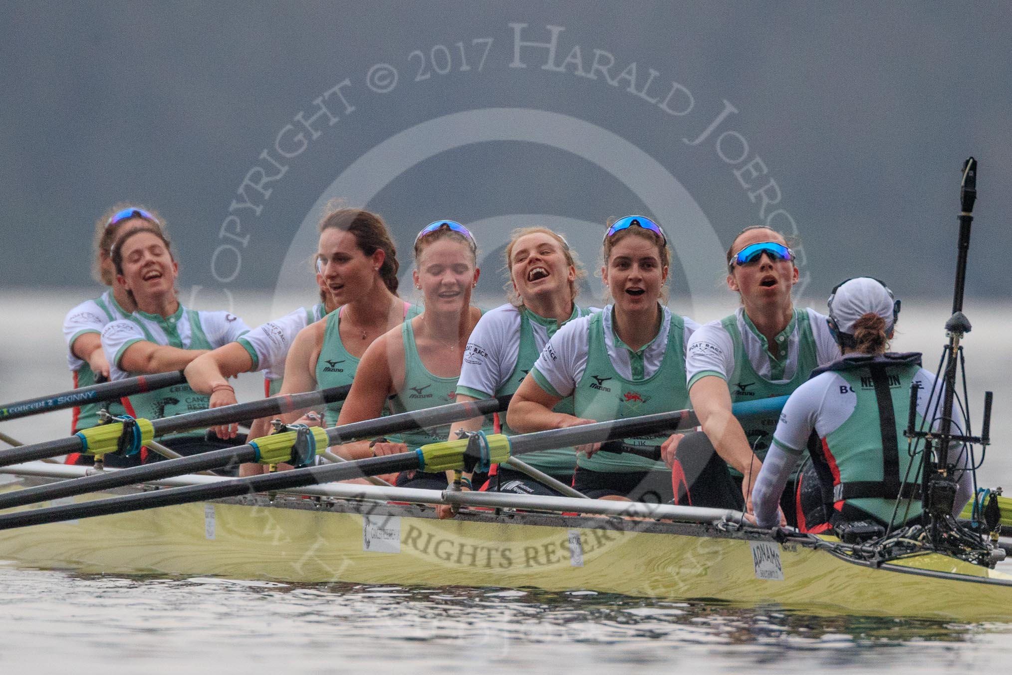 The Cancer Research UK Women's Boat Race 2018: The Cambridge women celebrating their win - bow Tricia Smith, 2 Imogen Grant, 3 Kelsey Barolak, 4 Thea Zabell, 5 Paula Wesselmann, 6 Alice White, 7 Myriam Goudet-Boukhatmi, stroke Olivia Coffey, cox Sophie Shapter.
River Thames between Putney Bridge and Mortlake,
London SW15,

United Kingdom,
on 24 March 2018 at 16:51, image #225