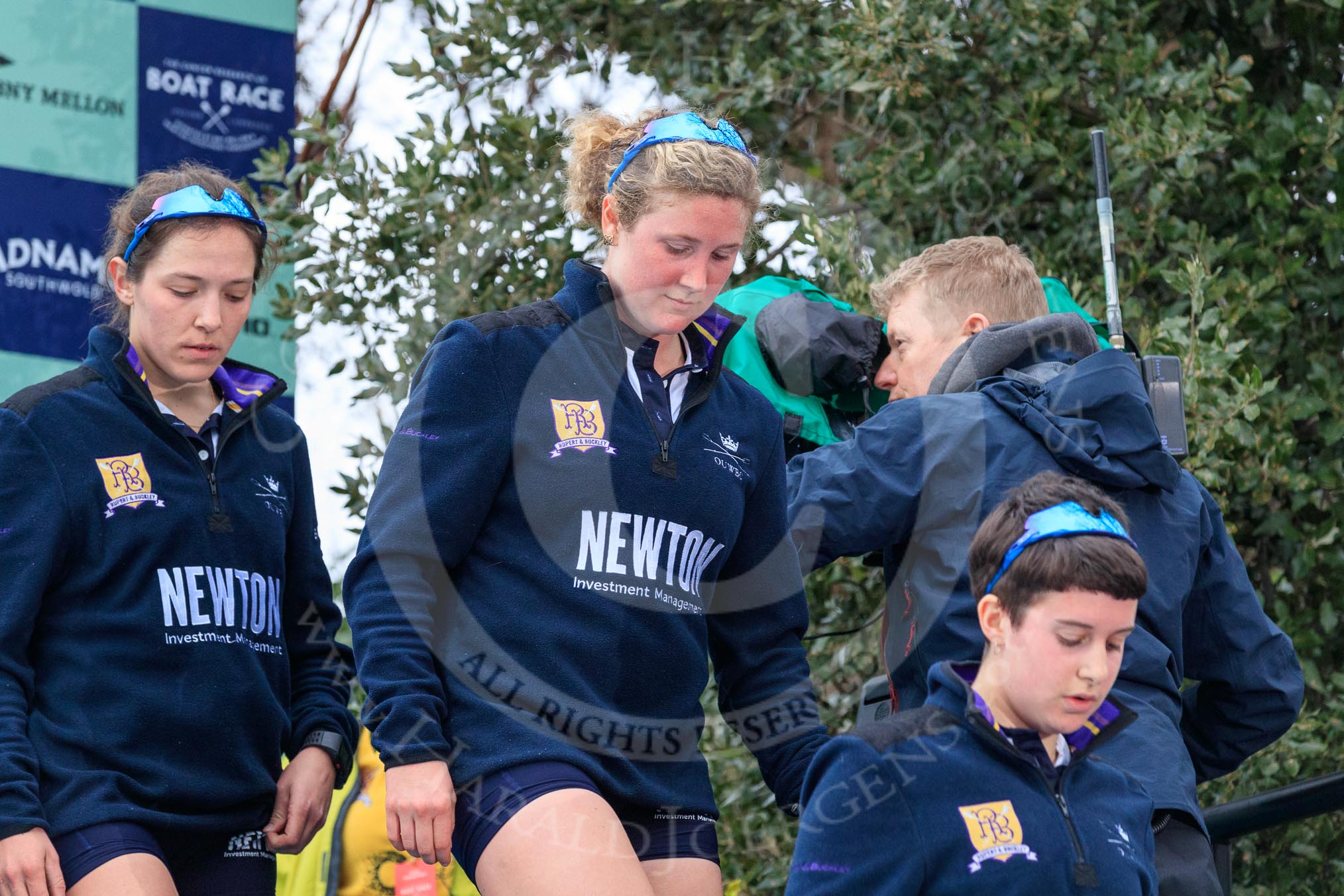 The Cancer Research UK Women's Boat Race 2018: Stepping down from the podium after the race - Oxford' s 6 seat Sara Kushma, 5 Morgan McGovern, 4 Alice Roberts.
River Thames between Putney Bridge and Mortlake,
London SW15,

United Kingdom,
on 24 March 2018 at 17:05, image #242