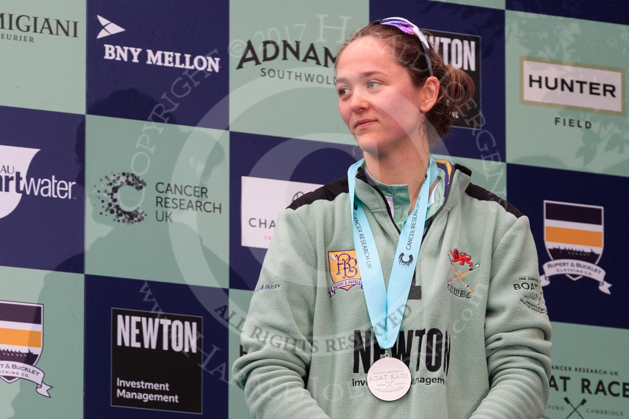 The Cancer Research UK Women's Boat Race 2018: Cambridge bow seat Tricia Smith, with her Women's Boat Race medal. on the podium.
River Thames between Putney Bridge and Mortlake,
London SW15,

United Kingdom,
on 24 March 2018 at 17:06, image #253