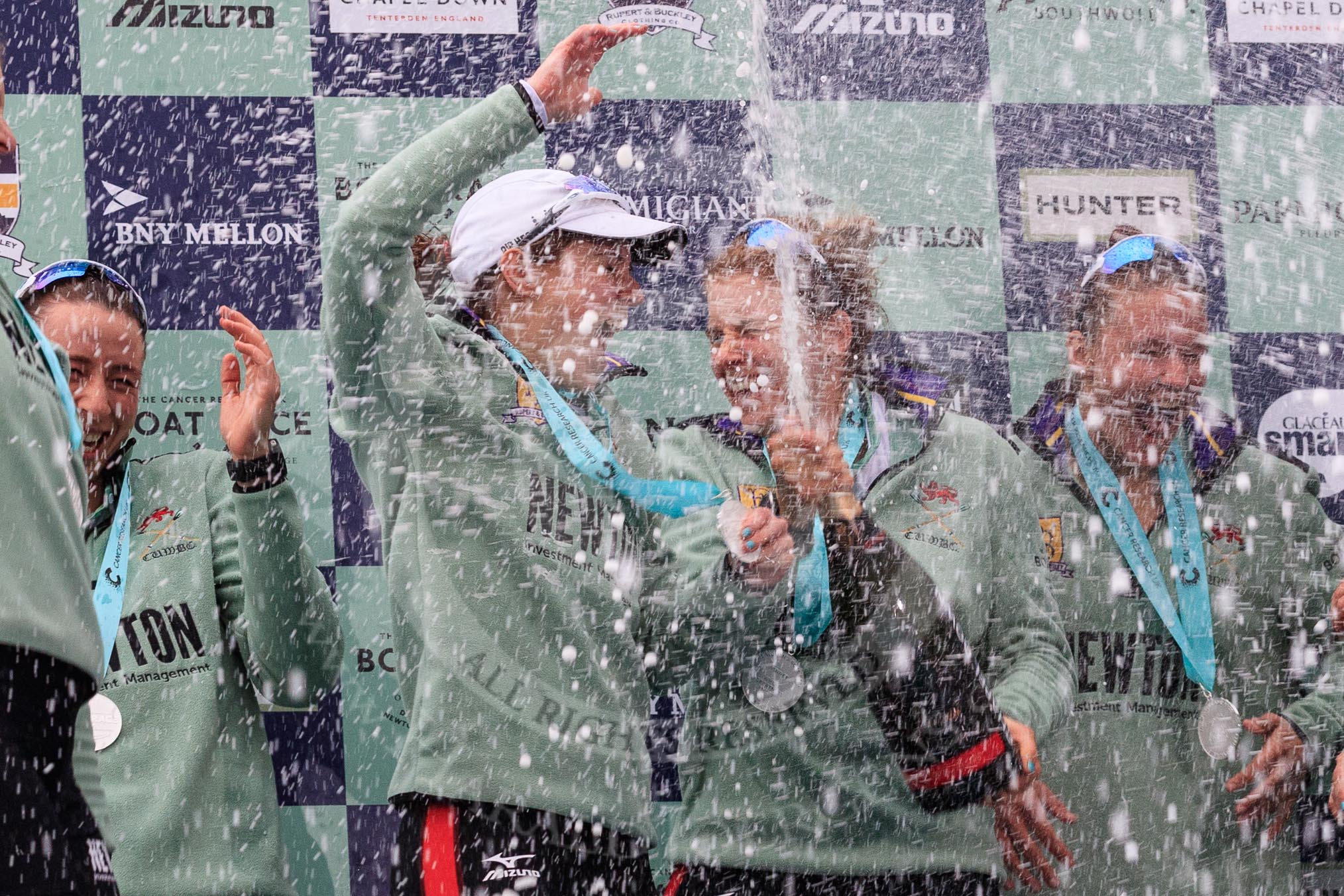 The Cancer Research UK Women's Boat Race 2018: The Cambridge women celebrating with their Boat Race medals, the Women's Boat Race trophy, and lots of Chapel Down Brut..
River Thames between Putney Bridge and Mortlake,
London SW15,

United Kingdom,
on 24 March 2018 at 17:09, image #280