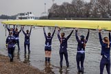 The Cancer Research UK Women's Boat Race 2018: The Oxford Blue Boat crew carrying their boat.
River Thames between Putney Bridge and Mortlake,
London SW15,

United Kingdom,
on 24 March 2018 at 15:43, image #97