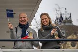 The Cancer Research UK Women's Boat Race 2018: A couple on board of Erasmus, a Thames passenger ship booked for friends and realives of Oxford, and moored close to the start line.
River Thames between Putney Bridge and Mortlake,
London SW15,

United Kingdom,
on 24 March 2018 at 16:16, image #143