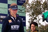 The Cancer Research UK Women's Boat Race 2018: Renée Koolschijn, at bow in the Oxford Blue Boat, stepping down from the podium after the race.
River Thames between Putney Bridge and Mortlake,
London SW15,

United Kingdom,
on 24 March 2018 at 17:05, image #237