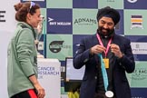 The Cancer Research UK Women's Boat Race 2018: Sir Harpal Kumar, CEO of Cancer Research UK. congratulating Cambridge 2 seat Imogen Grant at the trophy presentation.
River Thames between Putney Bridge and Mortlake,
London SW15,

United Kingdom,
on 24 March 2018 at 17:06, image #252