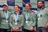 The Cancer Research UK Women's Boat Race 2018: Cambridge  3 seat Kelsey Barolak, 2 seat Imogen Grant, bow seat Tricia Smith, and CUWBC Head Coach Rob Baker with their Women's Boat Race medals. on the podium.
River Thames between Putney Bridge and Mortlake,
London SW15,

United Kingdom,
on 24 March 2018 at 17:08, image #273